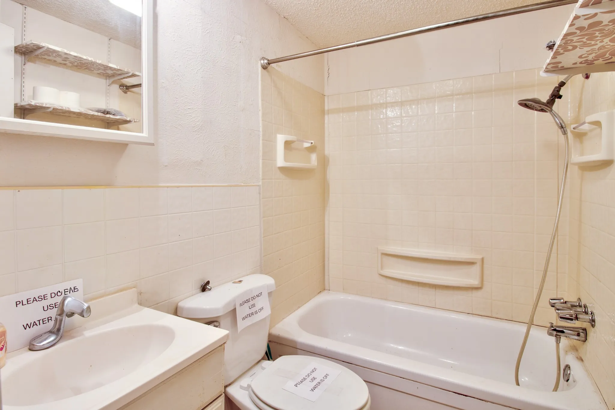 Bathroom with step in tub/shower.