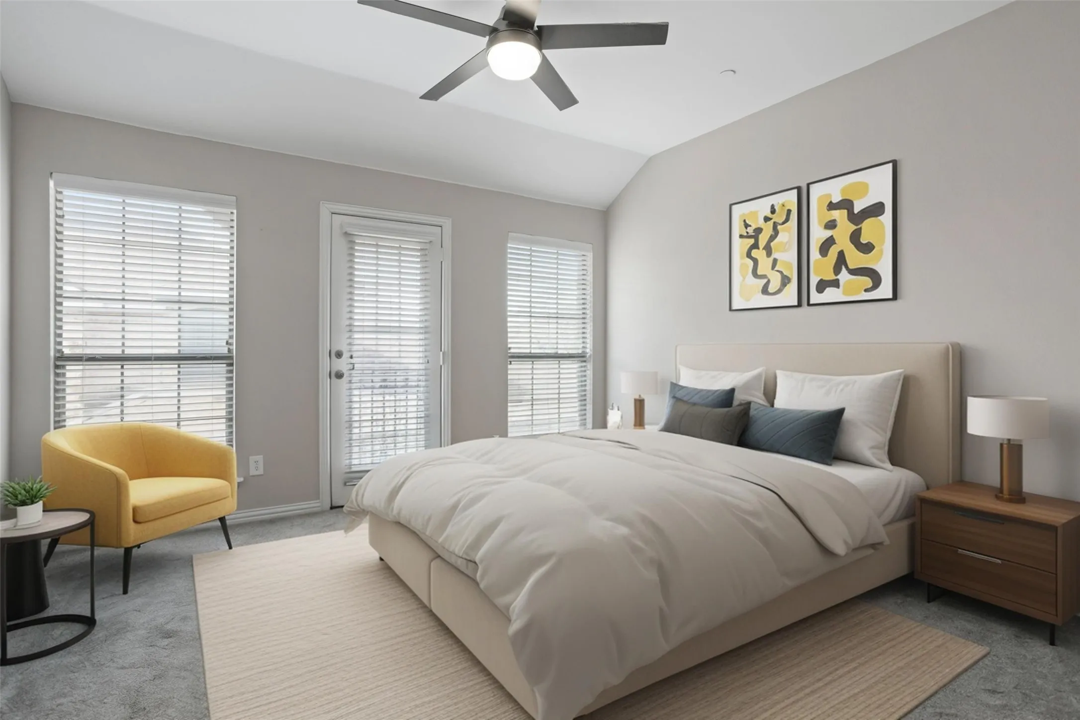 Vaulted ceiling with a ceiling fan, two windows with blinds, a glass-paneled door with blinds, and carpeted flooring