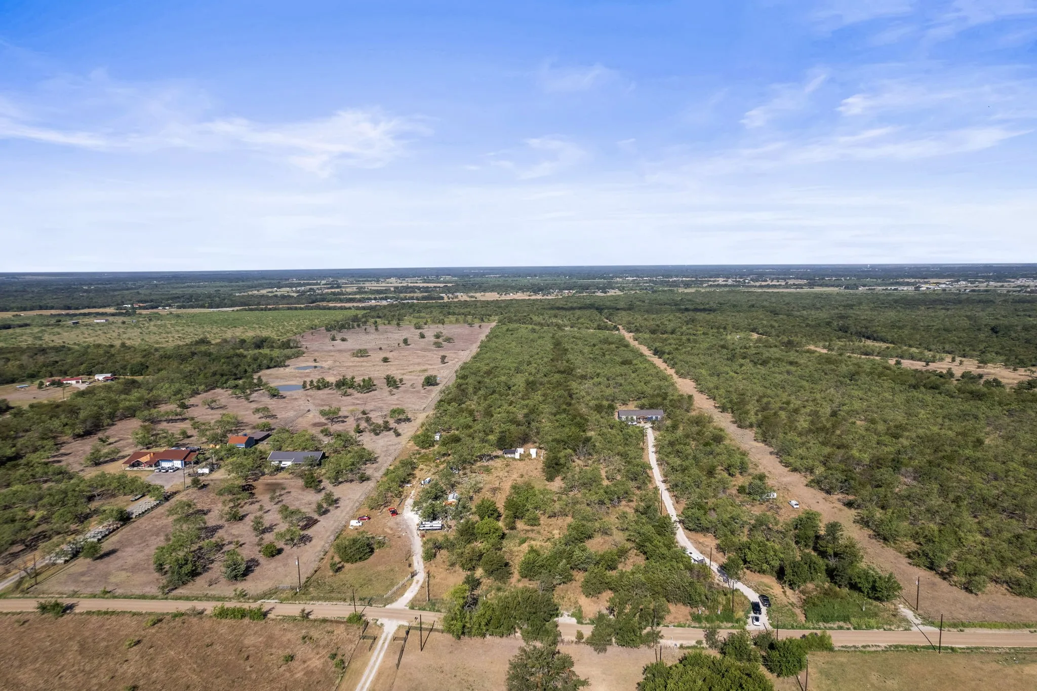Expansive lot with a single-story residence and detached structures