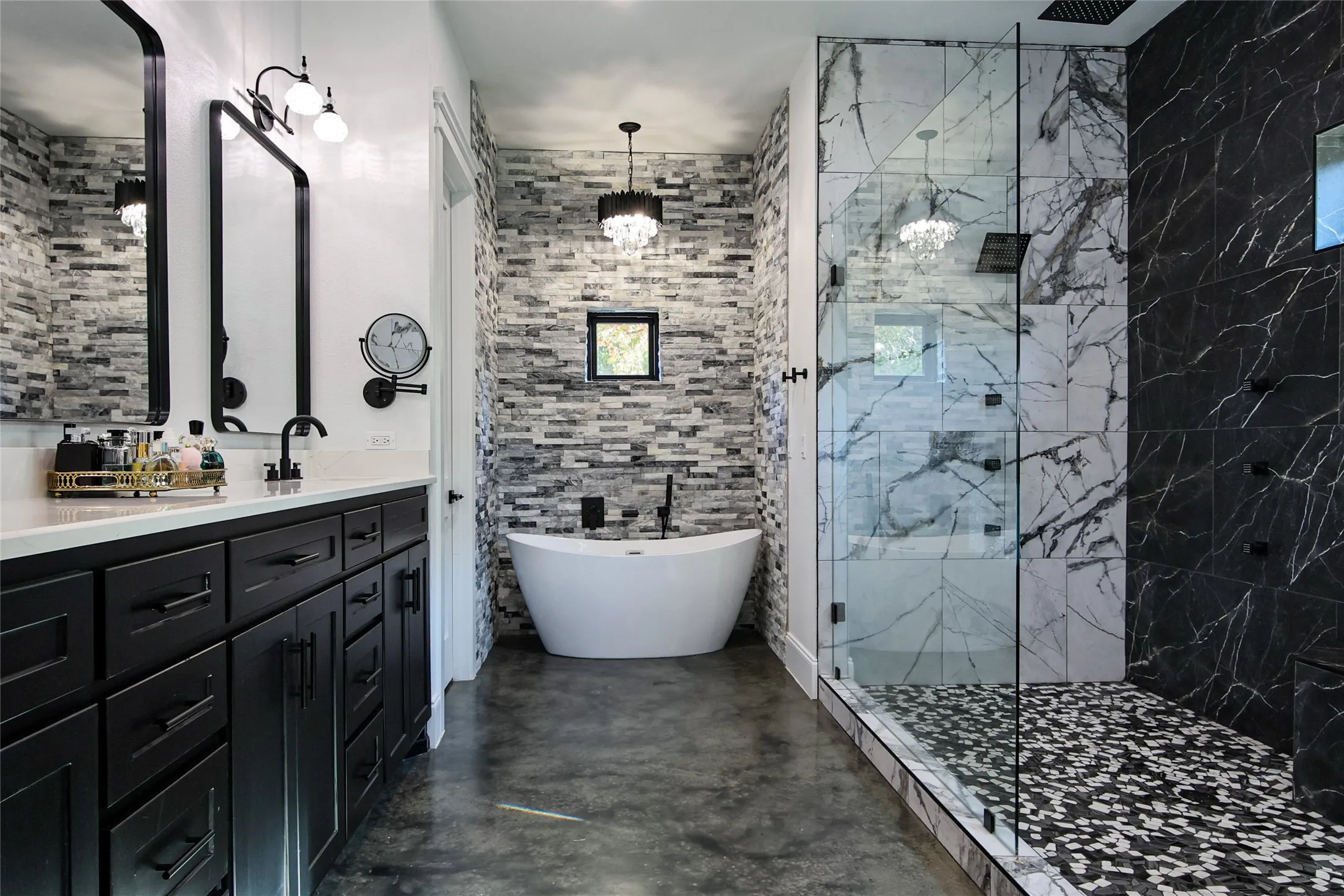 Dual vanity with dark cabinetry, white countertop, and matte black hardware