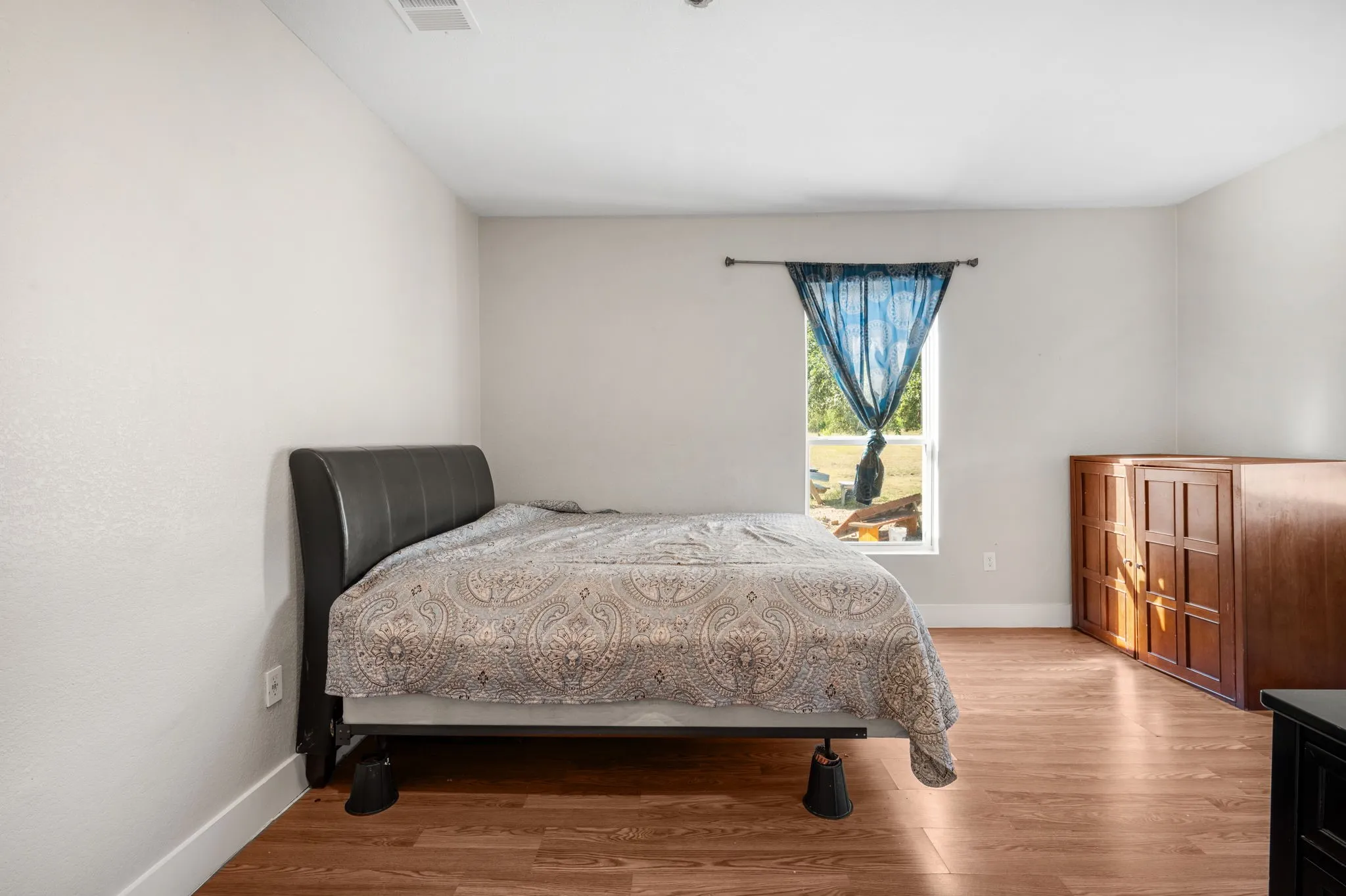 Hardwood-style flooring throughout
