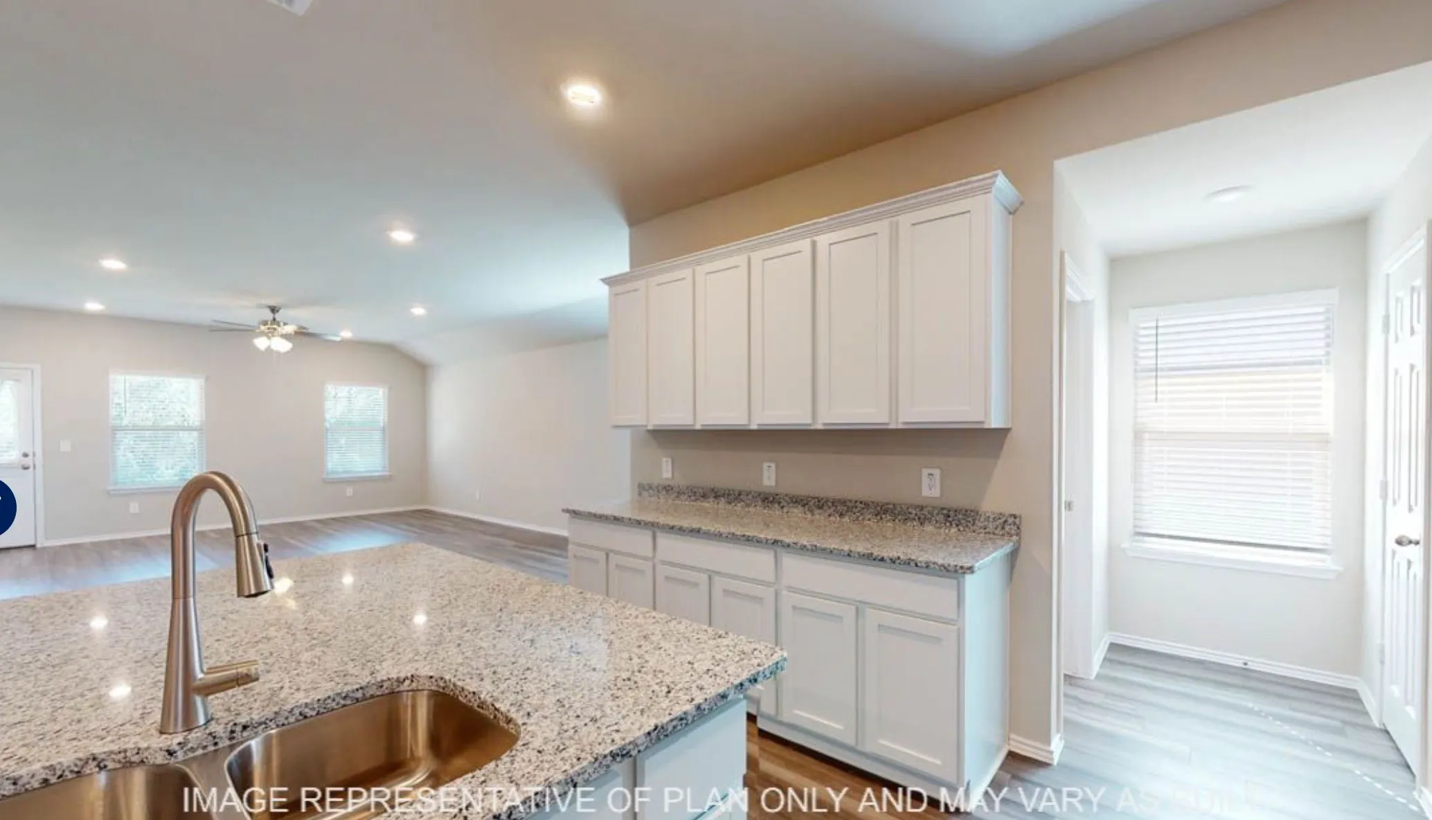 Kitchen island with stainless steel sink and gooseneck faucet