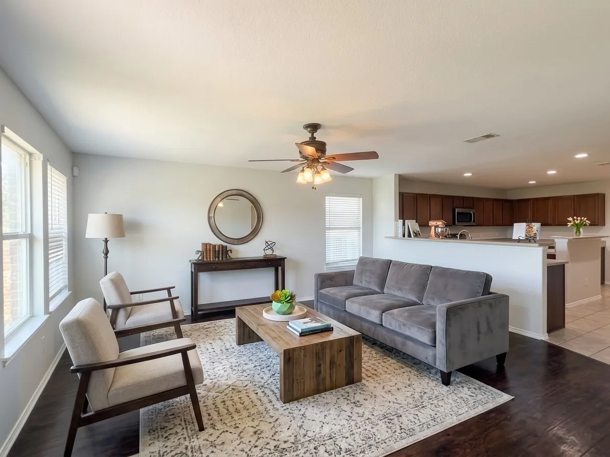 Recessed lighting, wood-finish flooring, ceiling fan, kitchen with wood cabinetry, and a tile backsplash