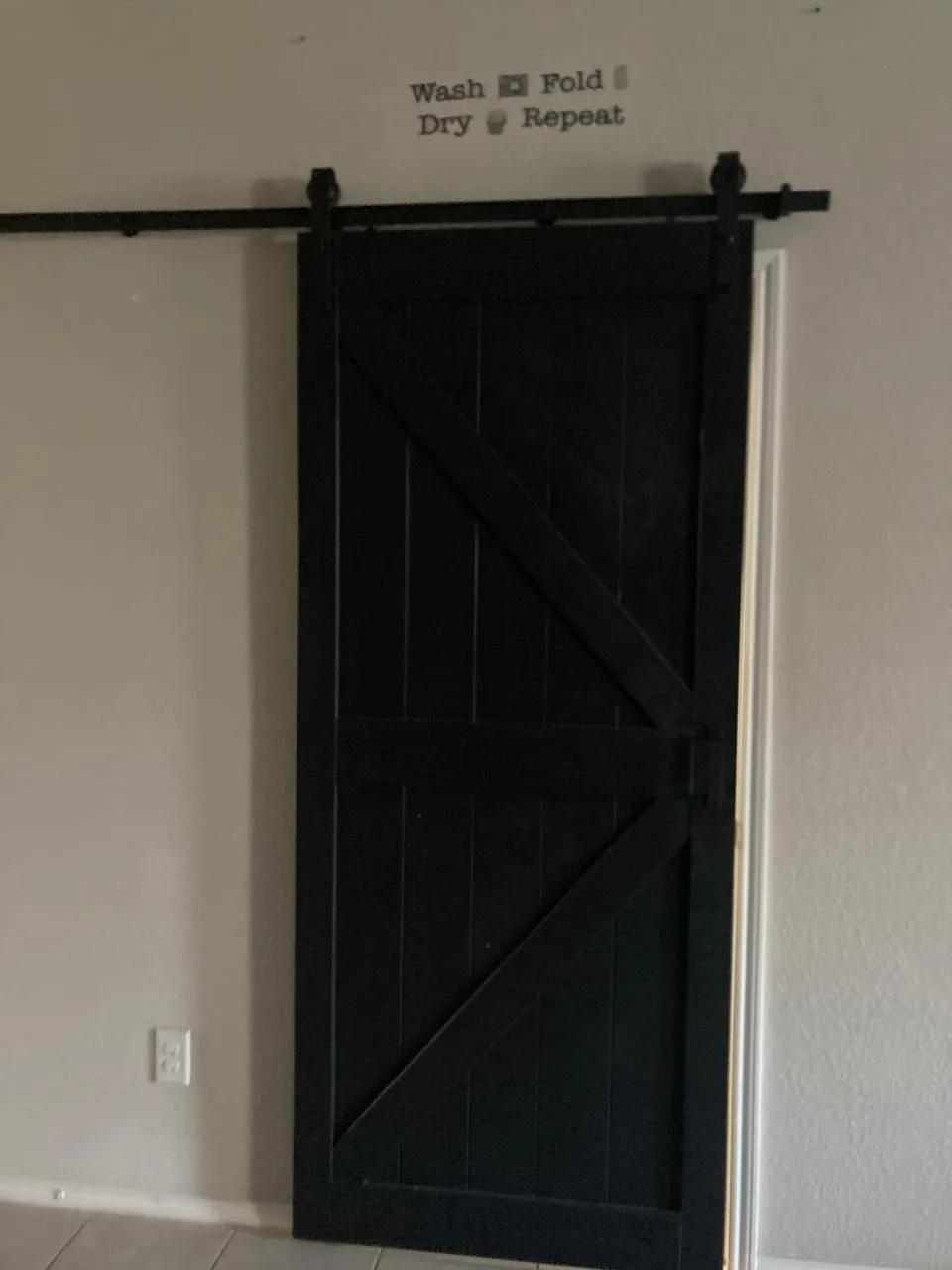 Barn-style door to the utility room