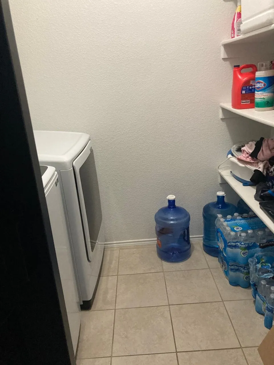 Good-sized utility room with open shelving