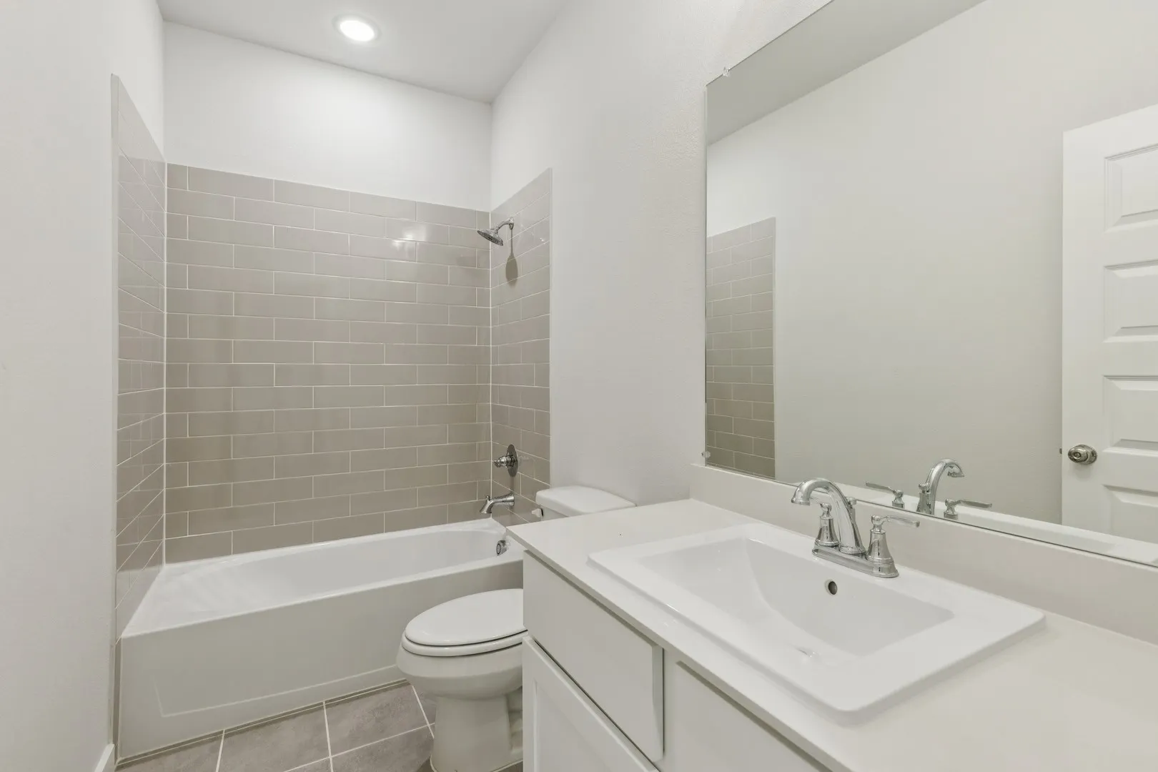 Bathroom in the Masters home plan by Trophy Signature Homes – REPRESENTATIVE PHOTO