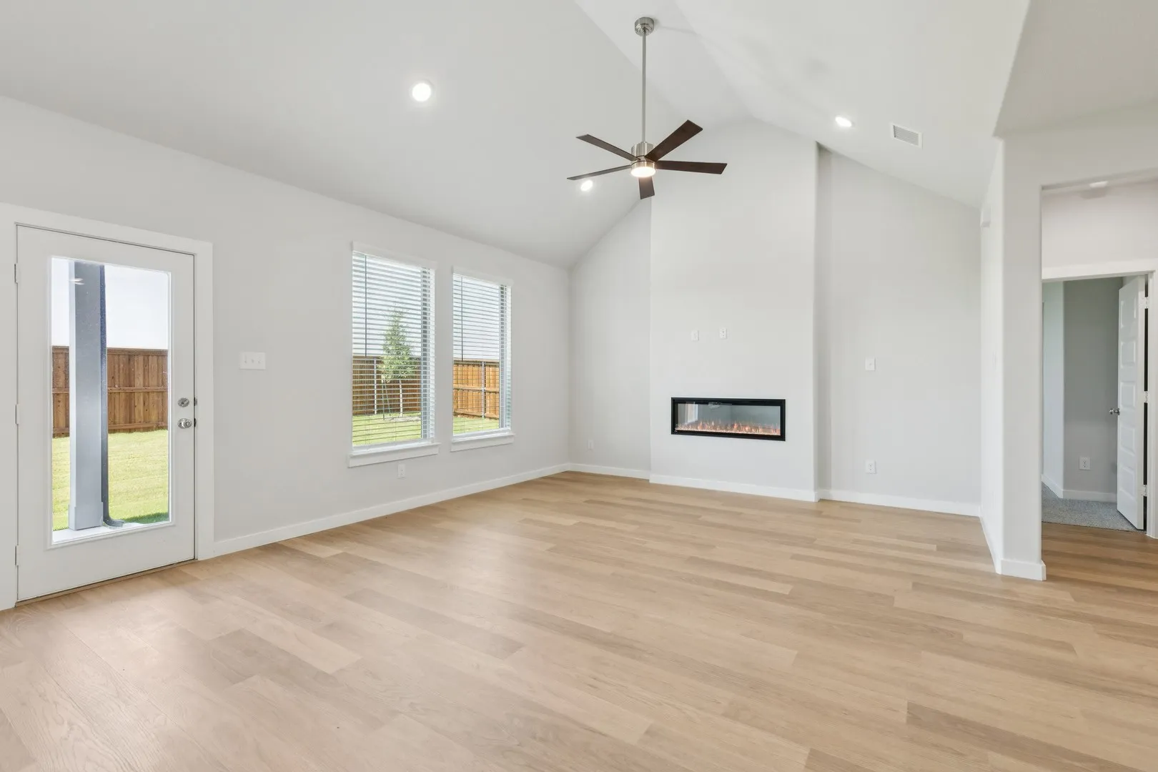 Living Room in the Masters home plan by Trophy Signature Homes – REPRESENTATIVE PHOTO