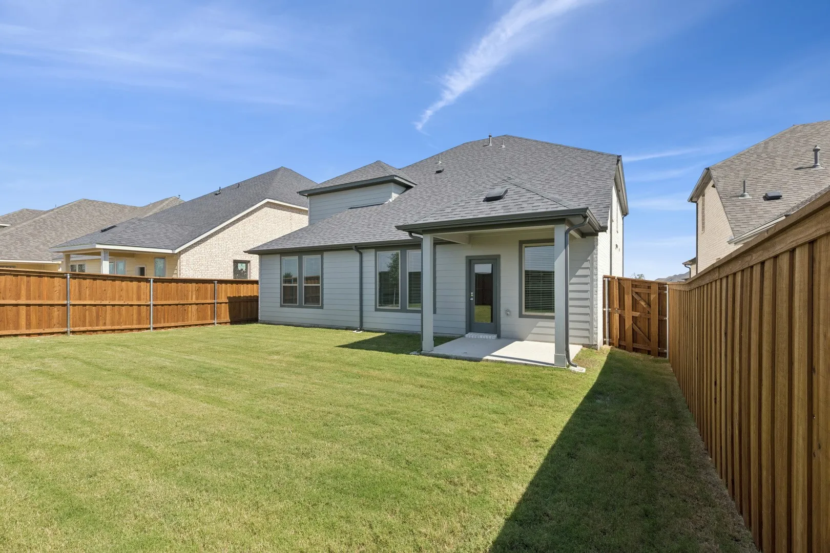 Covered Patio in the Masters home plan by Trophy Signature Homes – REPRESENTATIVE PHOTO