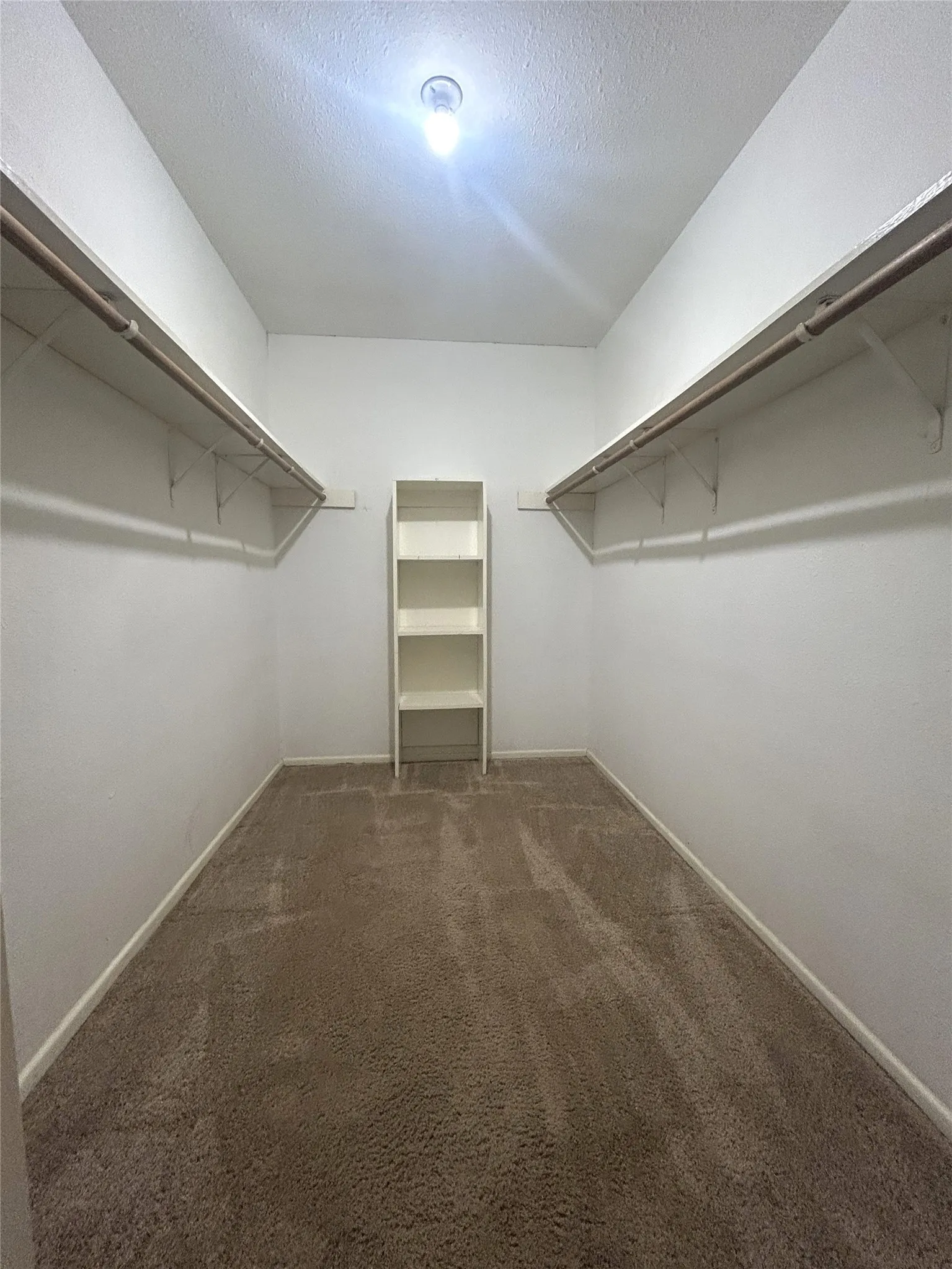 9 X 6 Walk in closet off the primary bedroom
