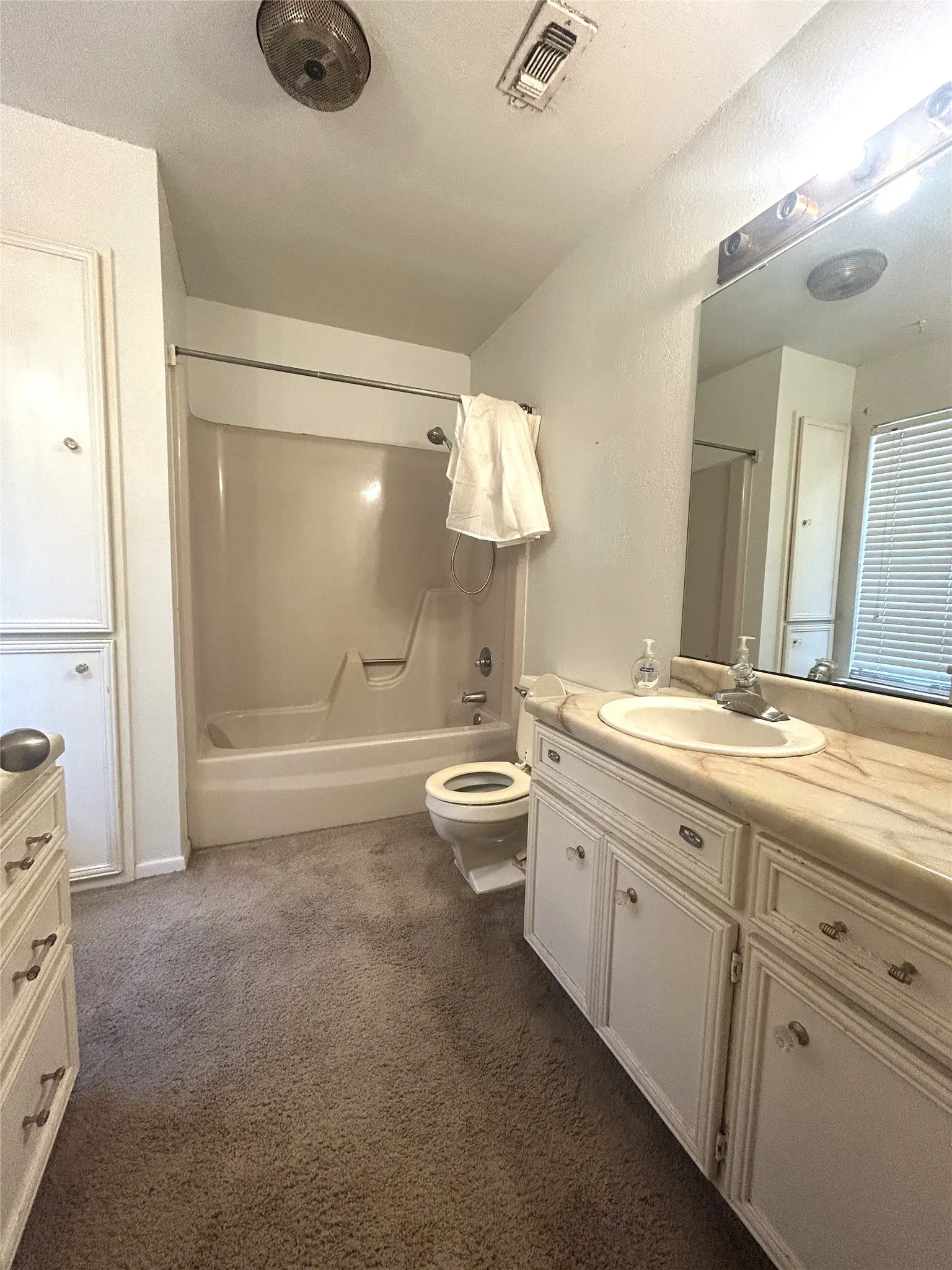 Primary bathroom with tub/shower combo