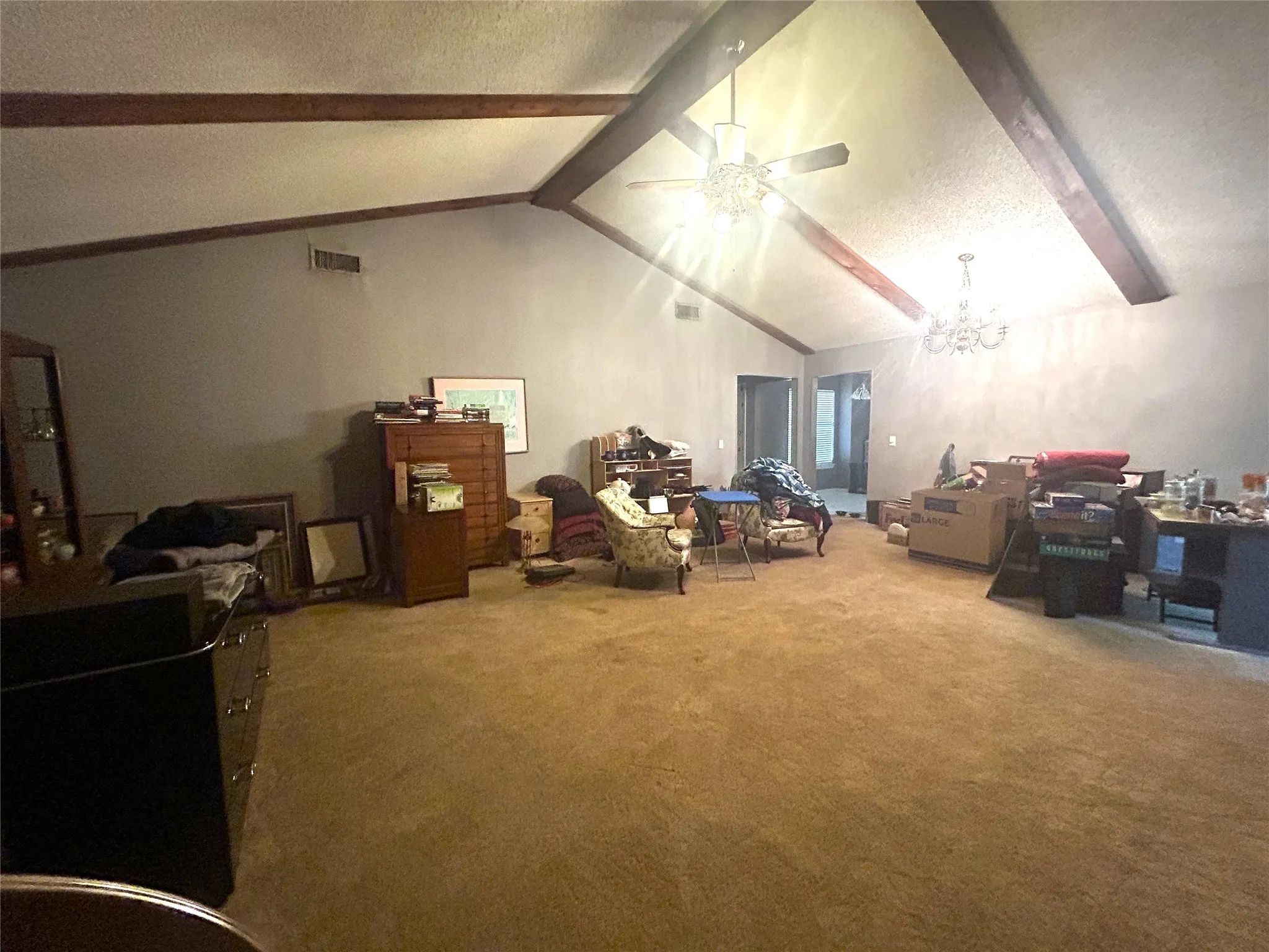 Spacious living area looking toward the front door.