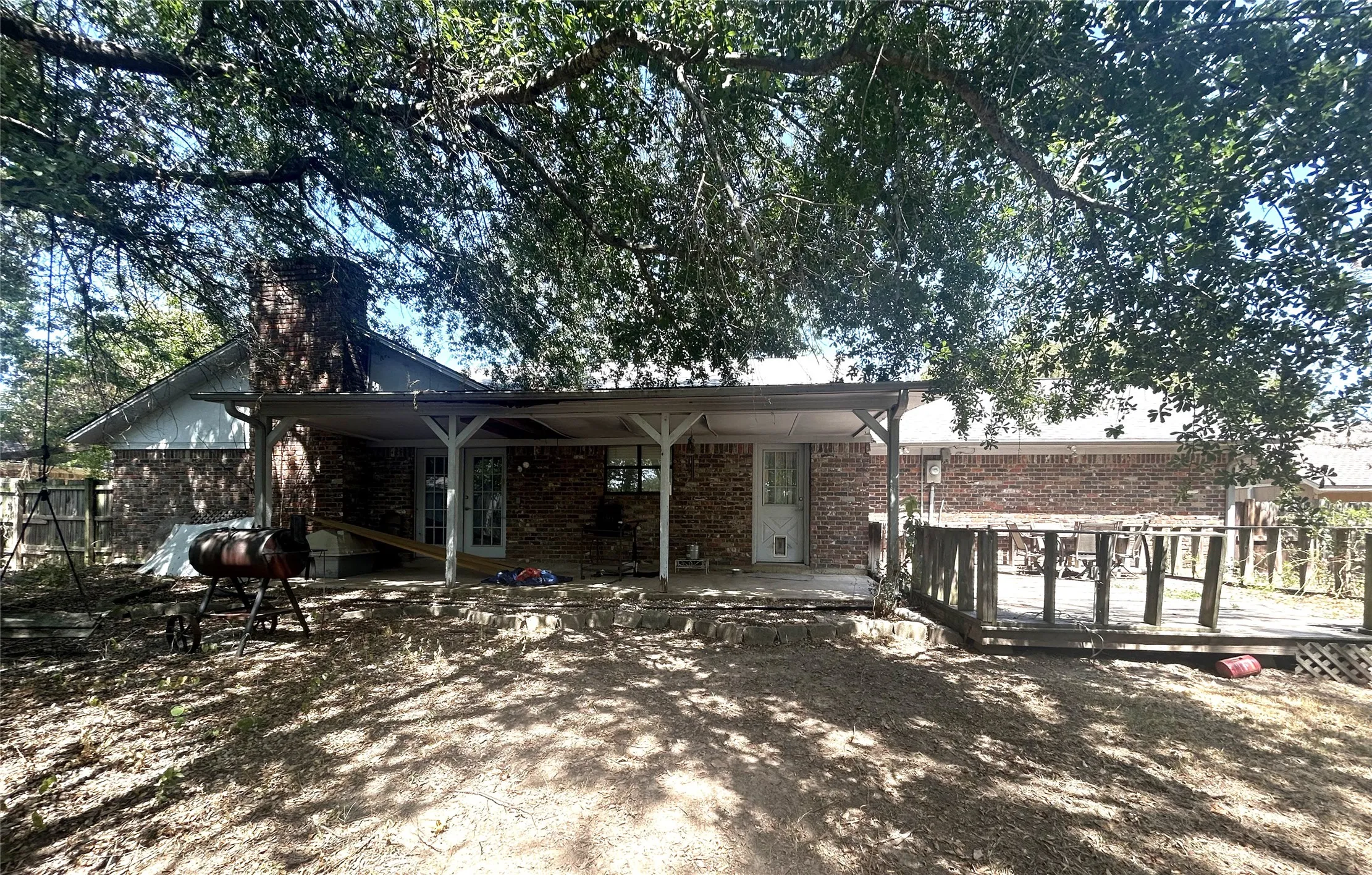 Shaded Back yard and nice sized covered porch