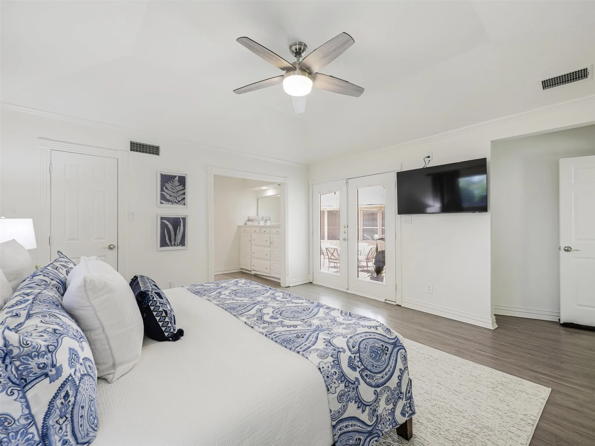 Primary Bedroom with private access to pool and patio