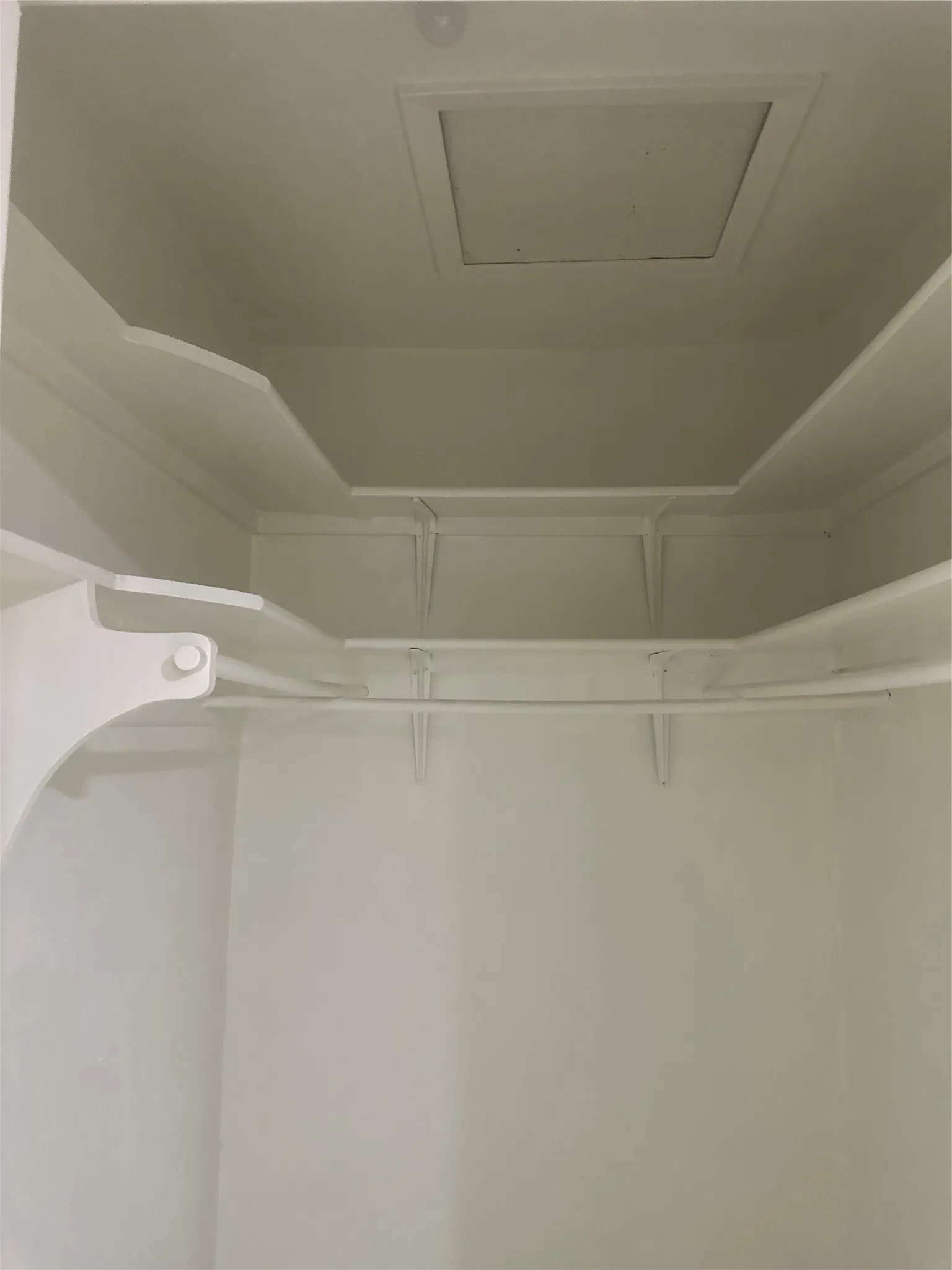 Integrated shelving and clothing rod system
