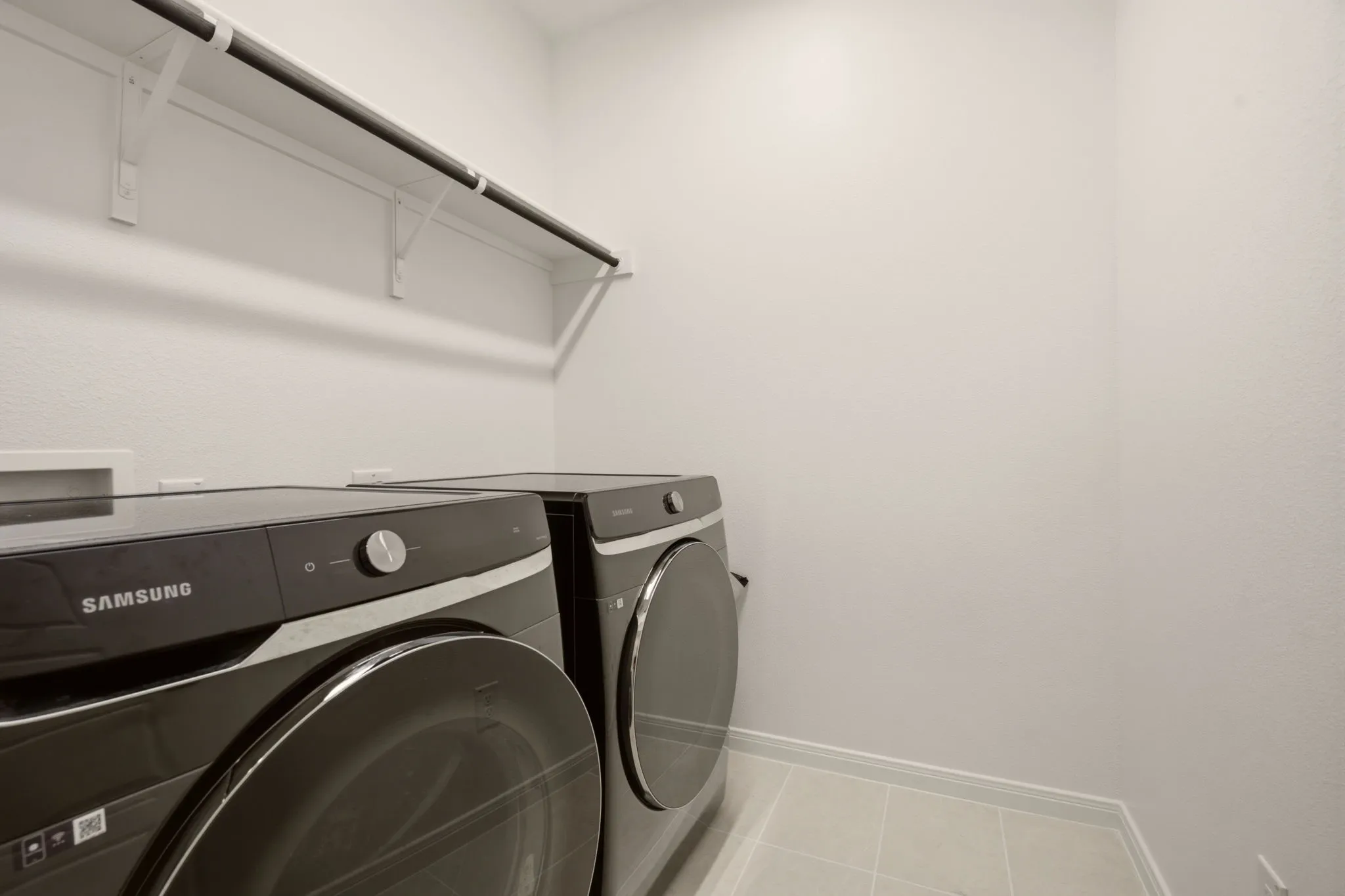 Upstairs laundry room.