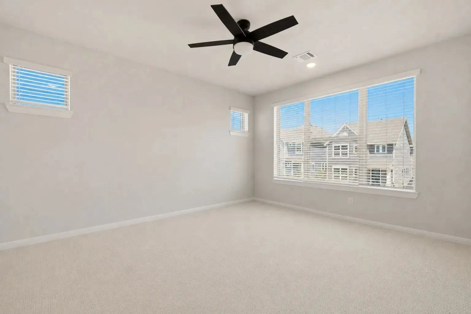 View of bedroom from the sitting area.