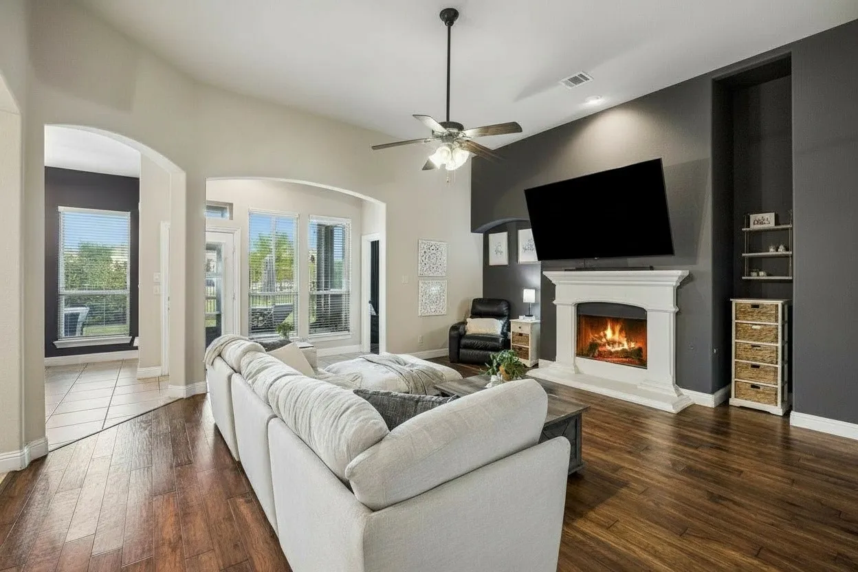 Open-concept family room connects naturally with the kitchen and breakfast area for comfortable everyday living and entertaining.
