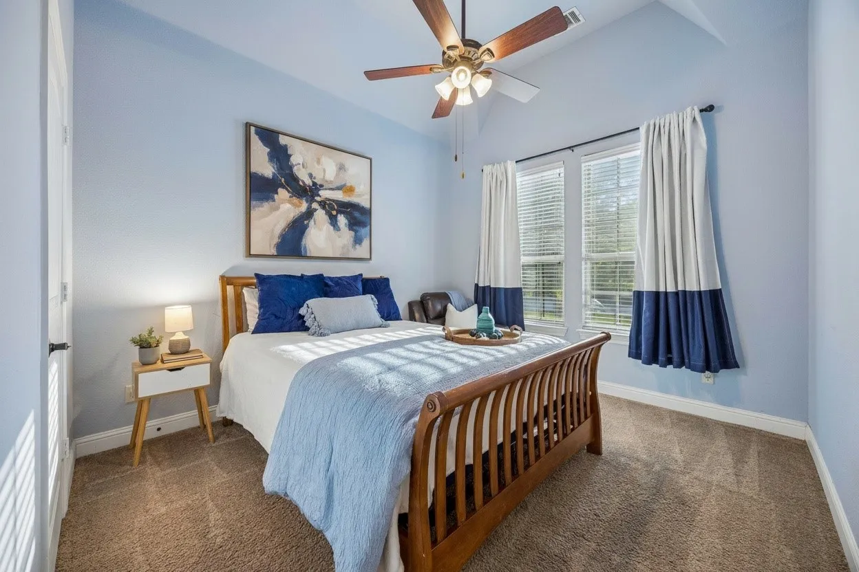 Third bedroom downstairs makes this floor plan especially versatile for buyers seeking multiple first-floor bedrooms.