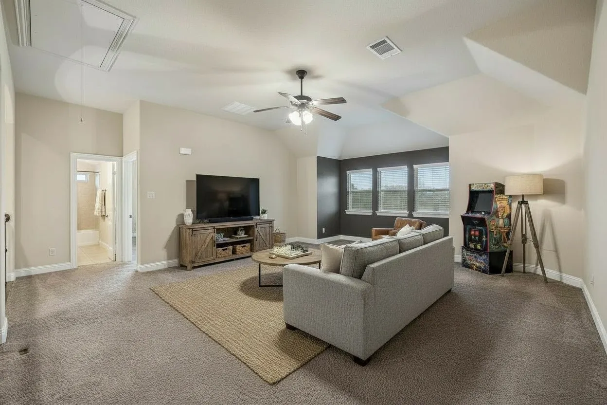 Large upstairs game room creates a second living area with plenty of flexibility for recreation, media or entertaining.
