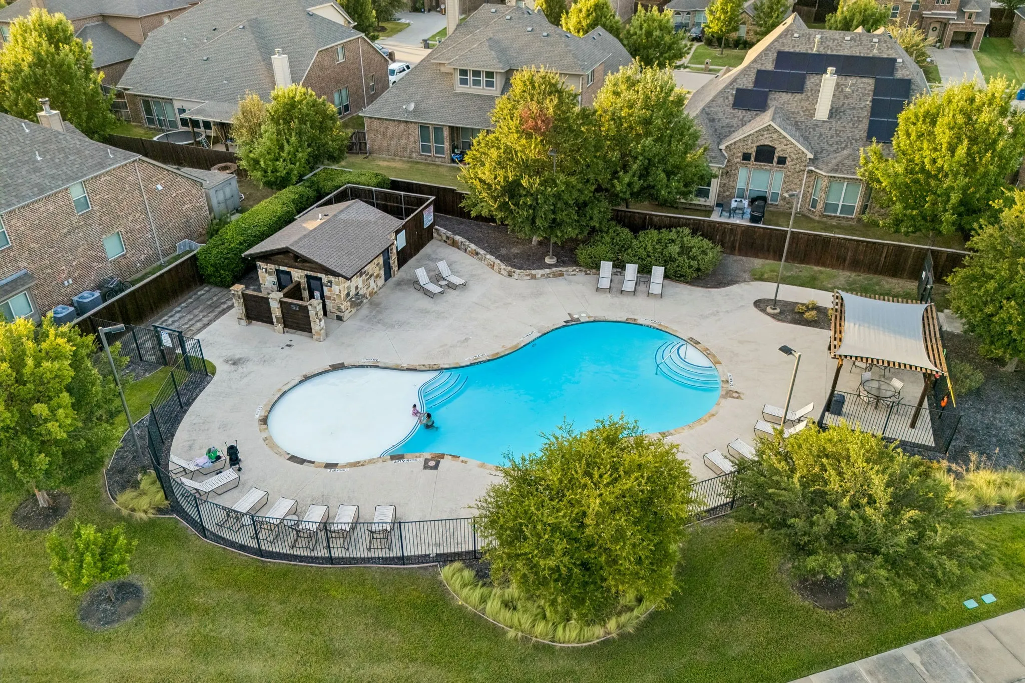 Community amenities include a neighborhood swimming pool for residents to enjoy.