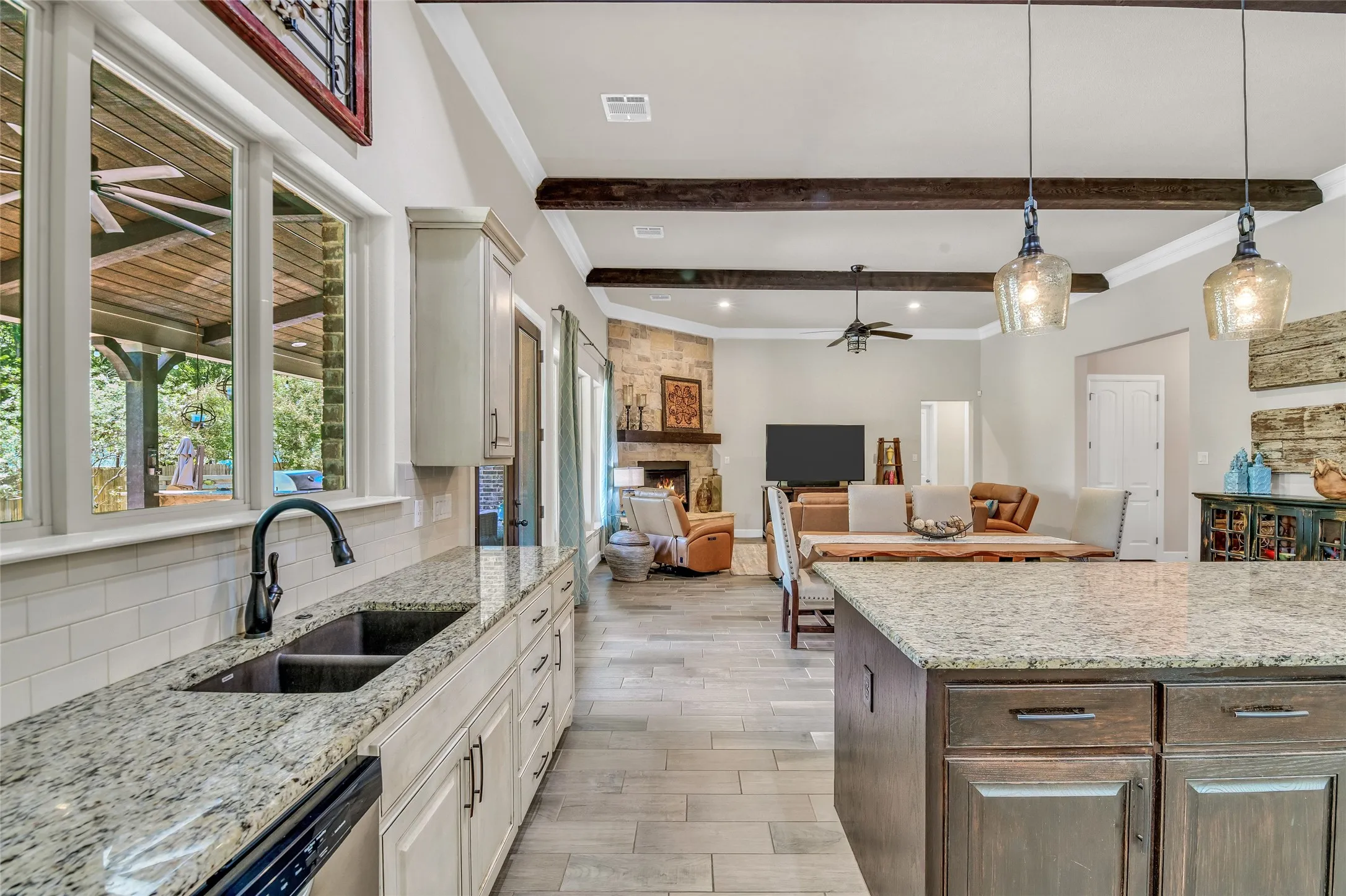 Wood look tile throughout the living areas is super functional and beautiful!