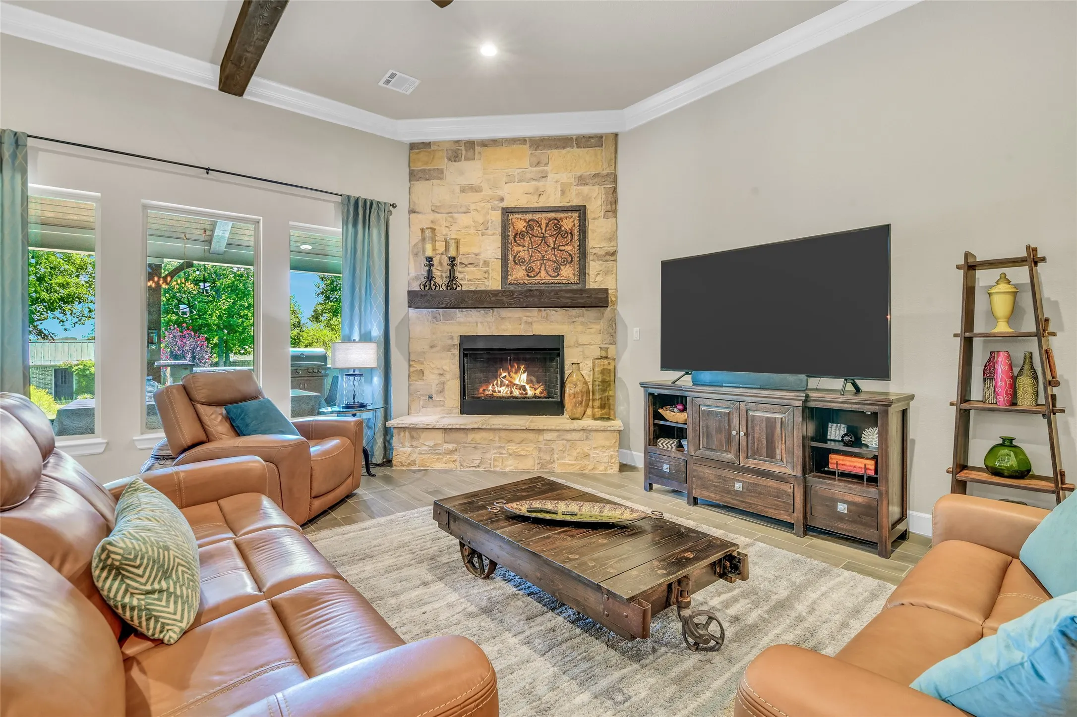 Stone fireplace and gas logs