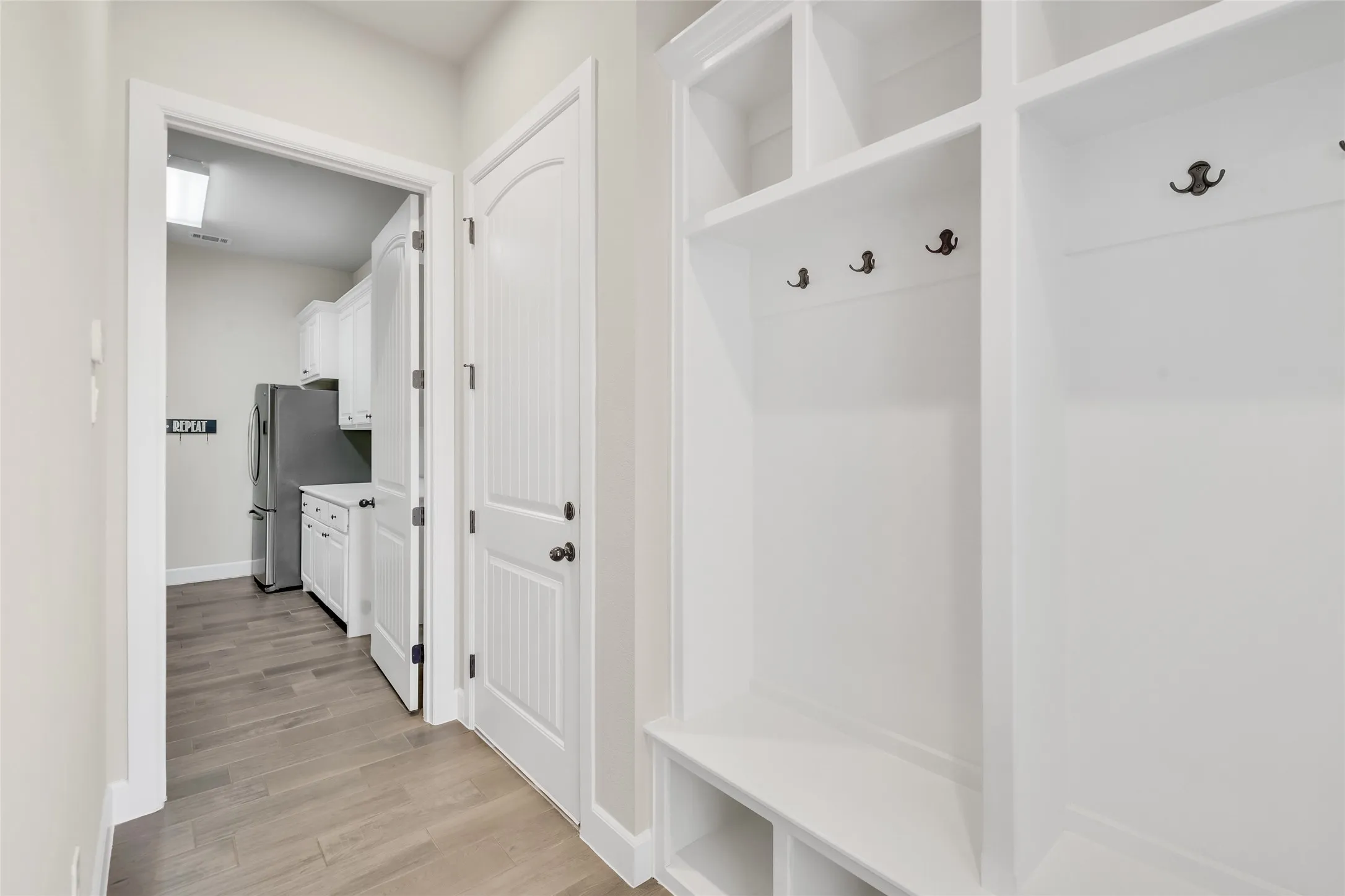 Organize your heart away with this wonderful mud area and utility room right inside the garage. And  don't miss the door from the drive into the mud area for drop off and pick up convenience.