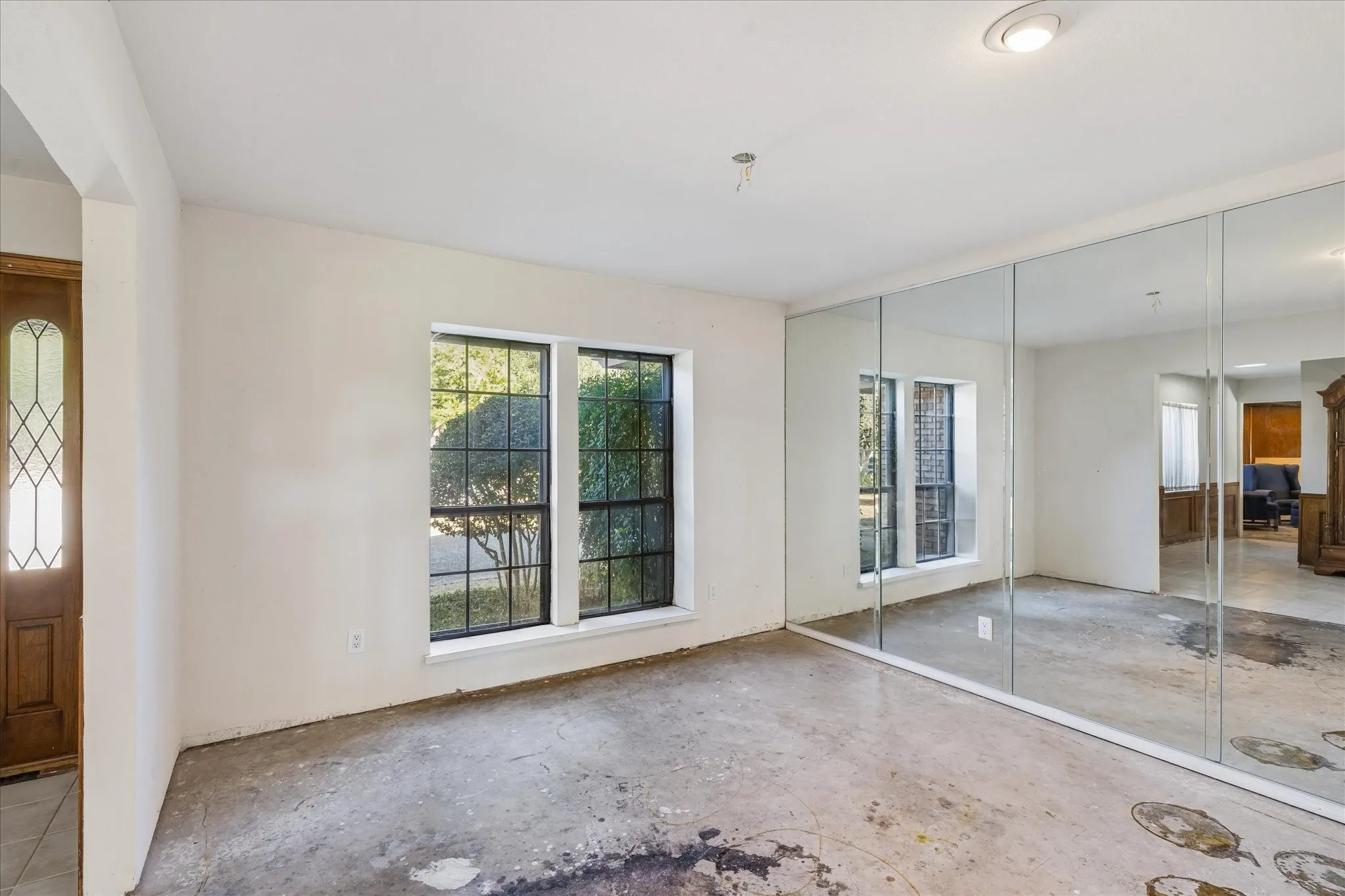 dining area could be used for home office, with view of front of neighborhood.