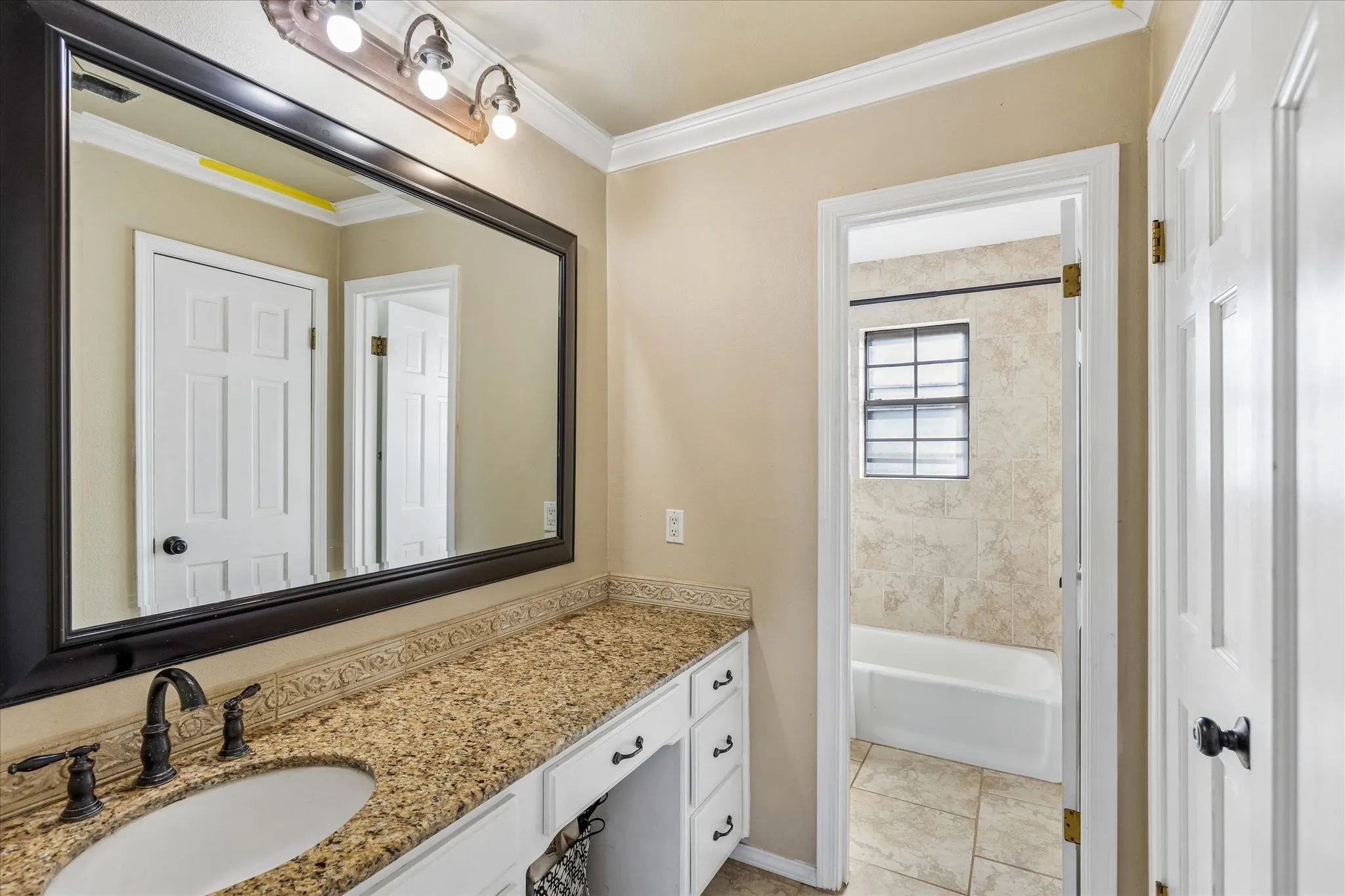 Second floor. Bathroom has separate dressing and shower areas for sharing.
