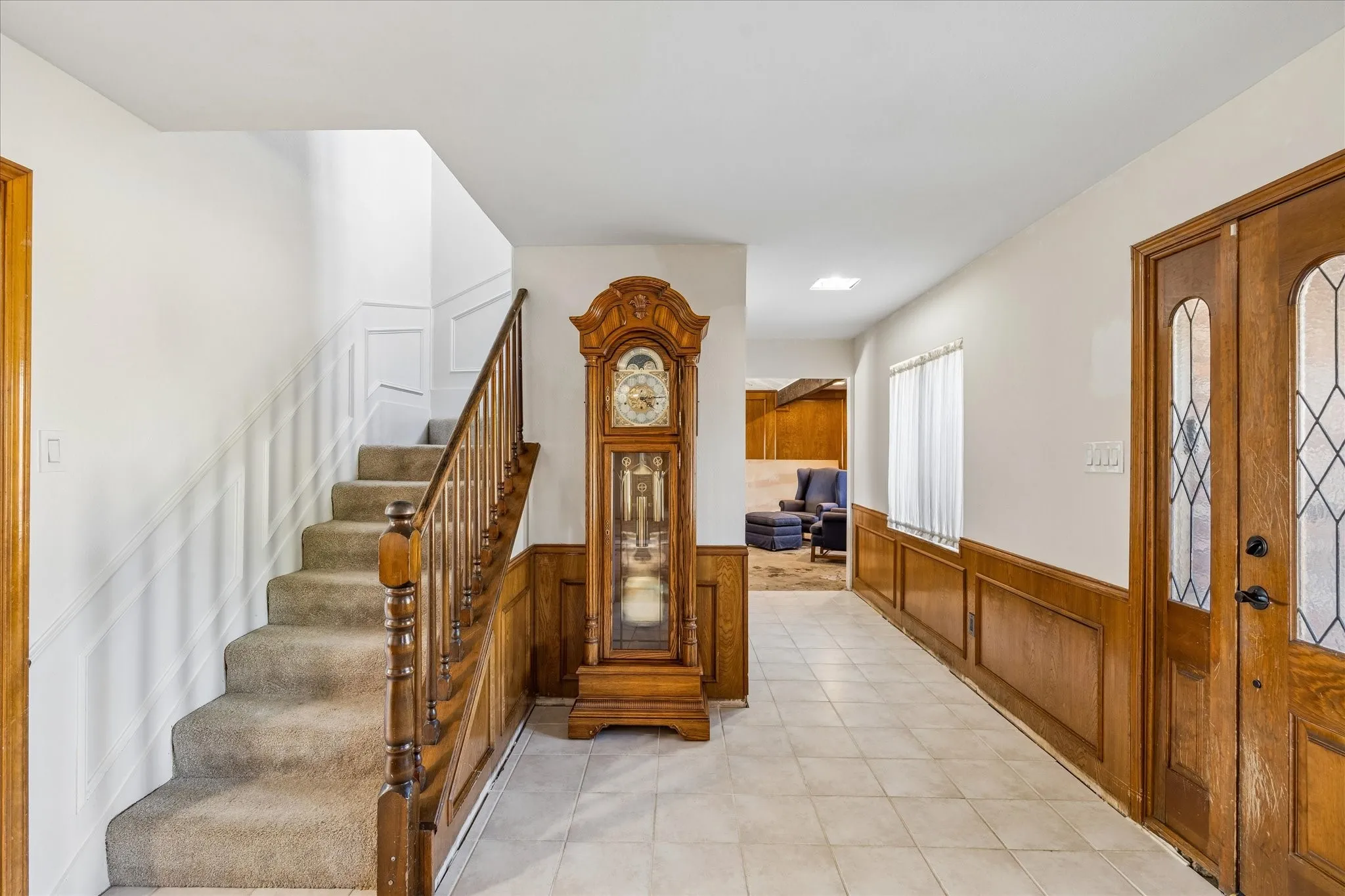 Large entry leads to Family room and 1/2 guest bath