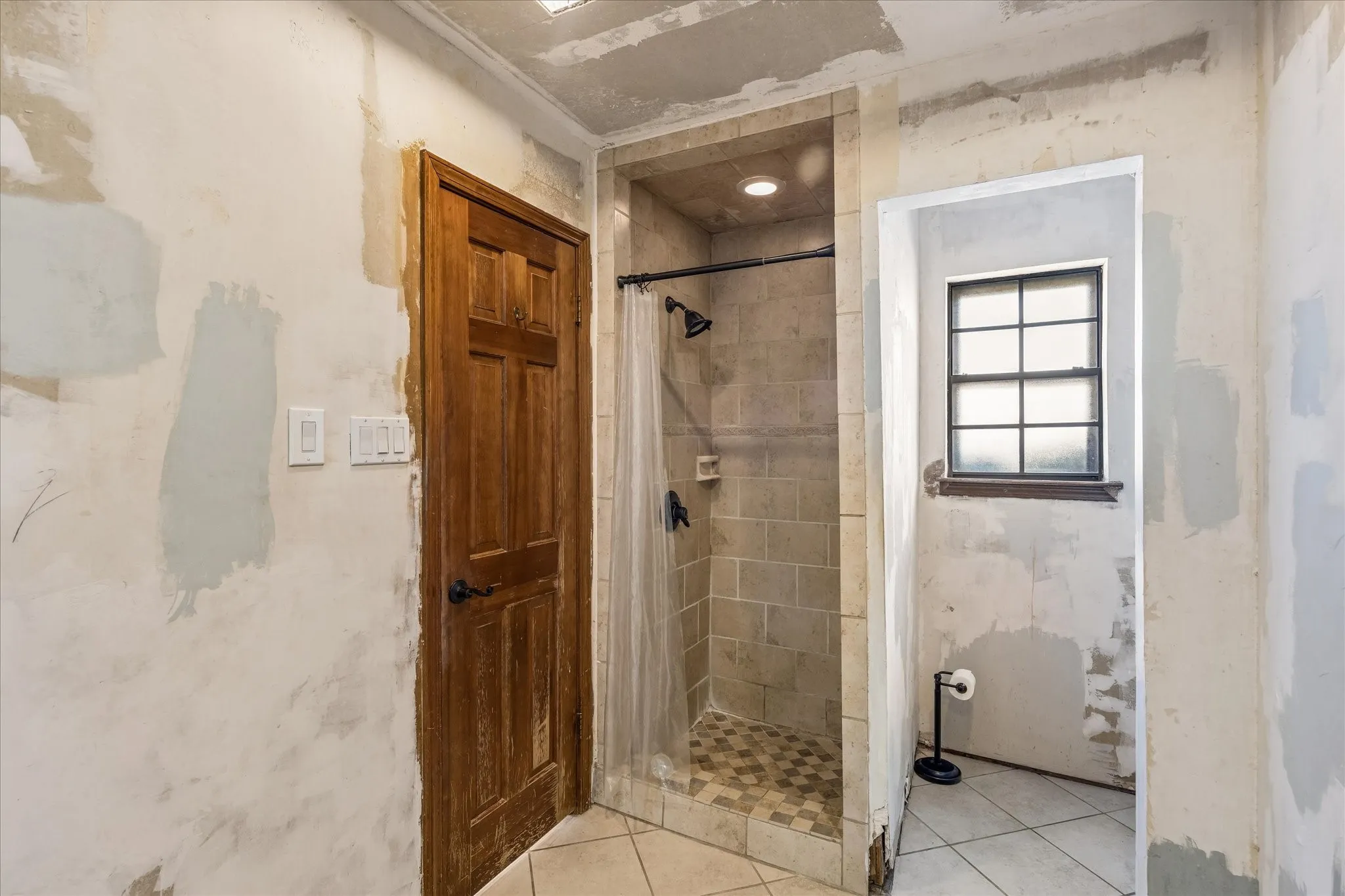 Primary bathroom shower and throne room. Plenty of space in this room for walk-in shower and soaking tub.