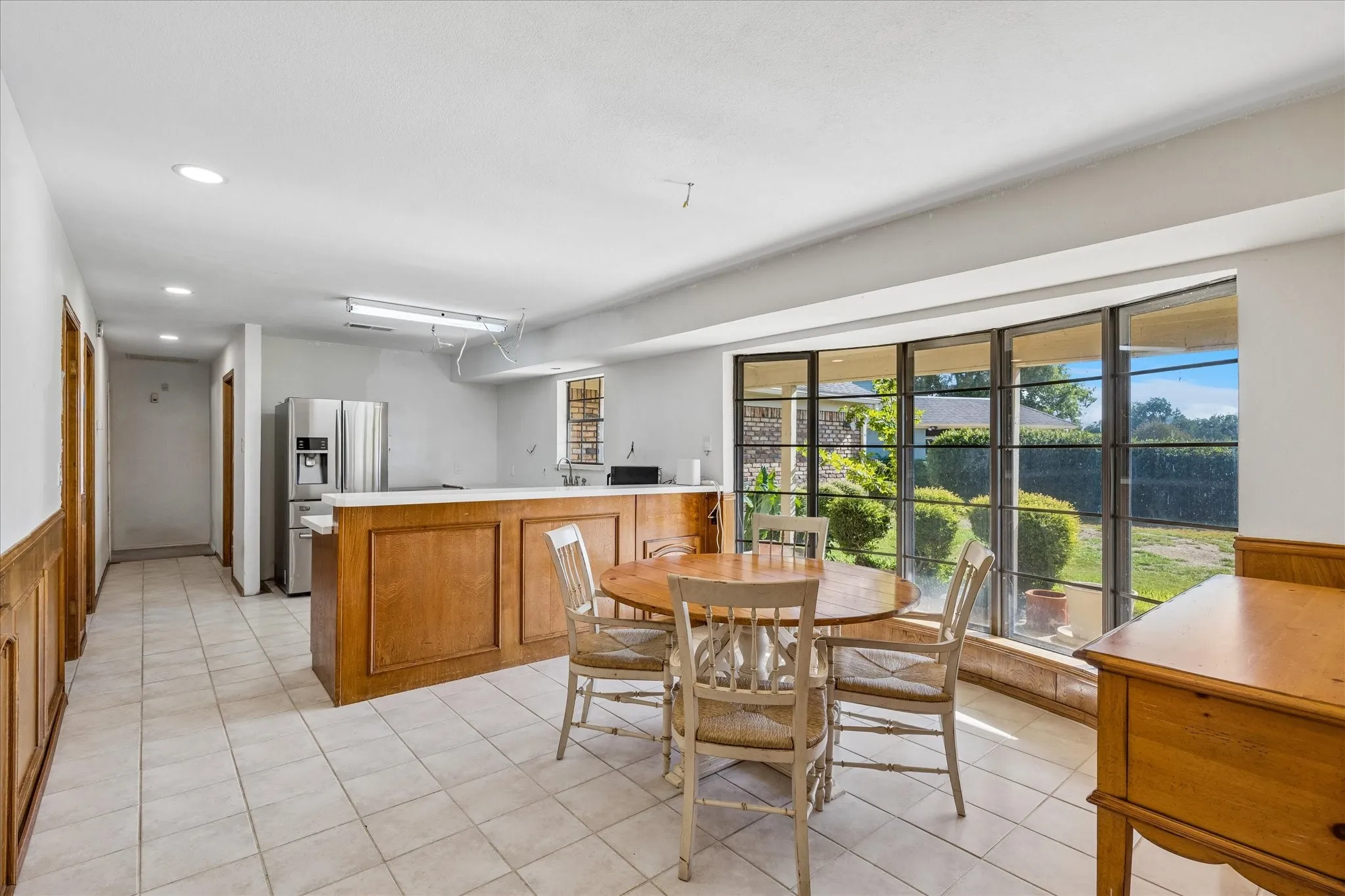 Breakfast area with lovely view of the golf course and back covered patio.