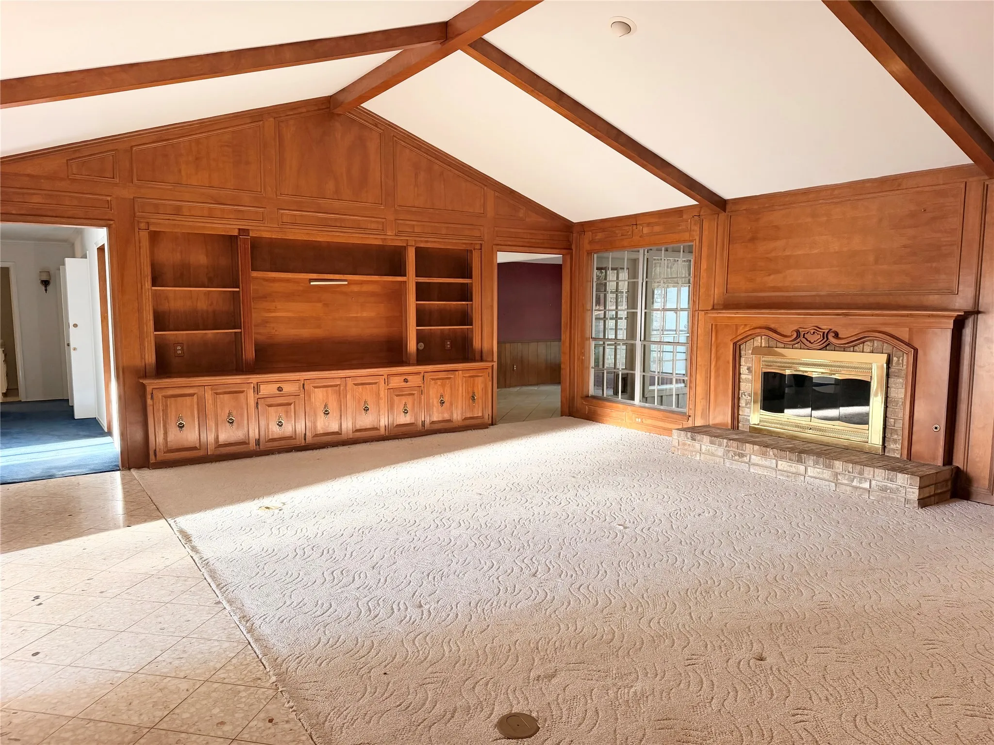 Living room with built in and Gas Fireplace
