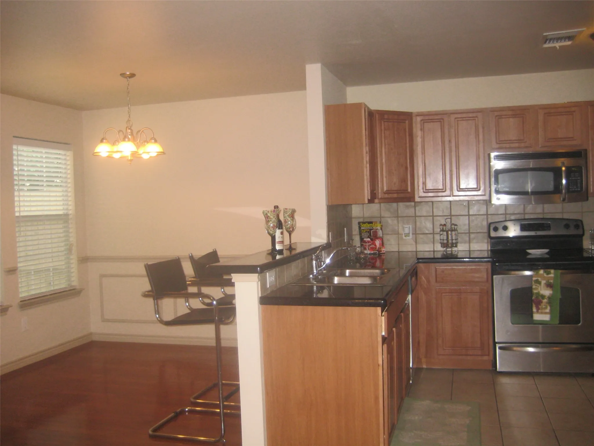 Dining Area off Kitchen and view of backyard