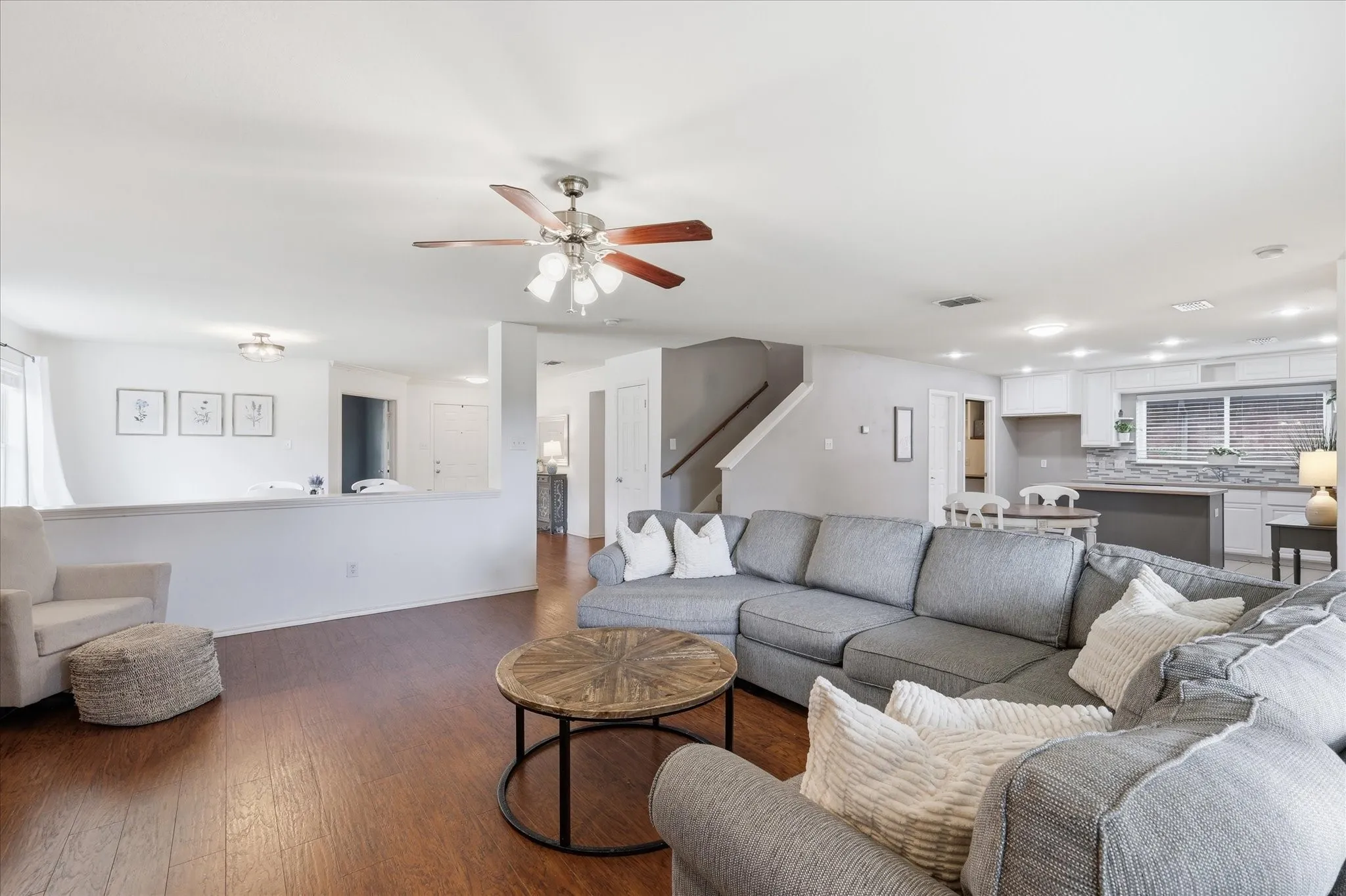 Open to formal dining room and kitchen