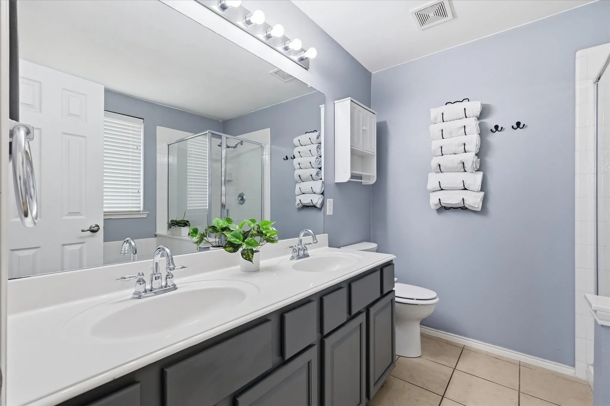 Primary bathroom with dual sink vanity