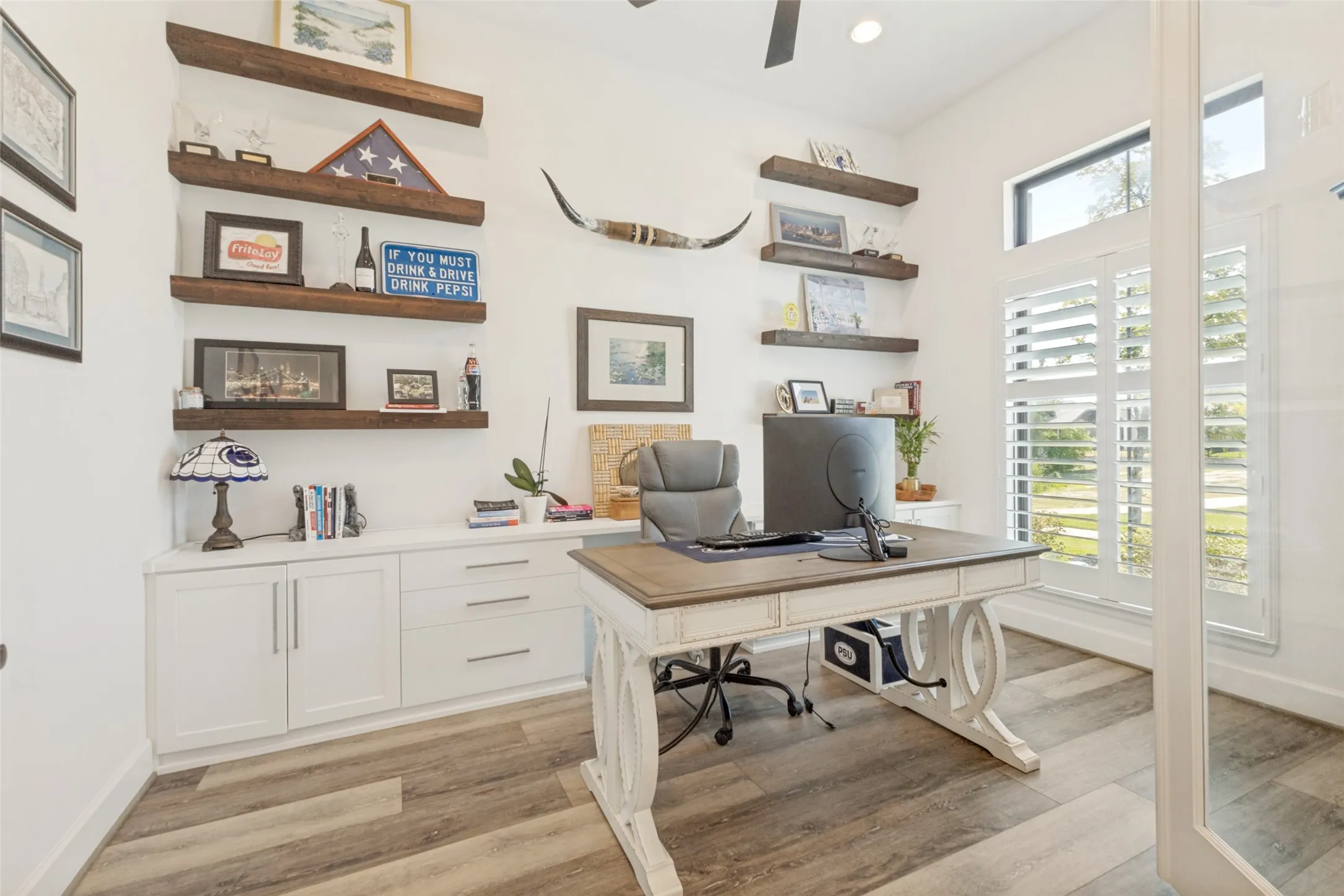 Built-in cabinetry with white shaker-style doors and drawers