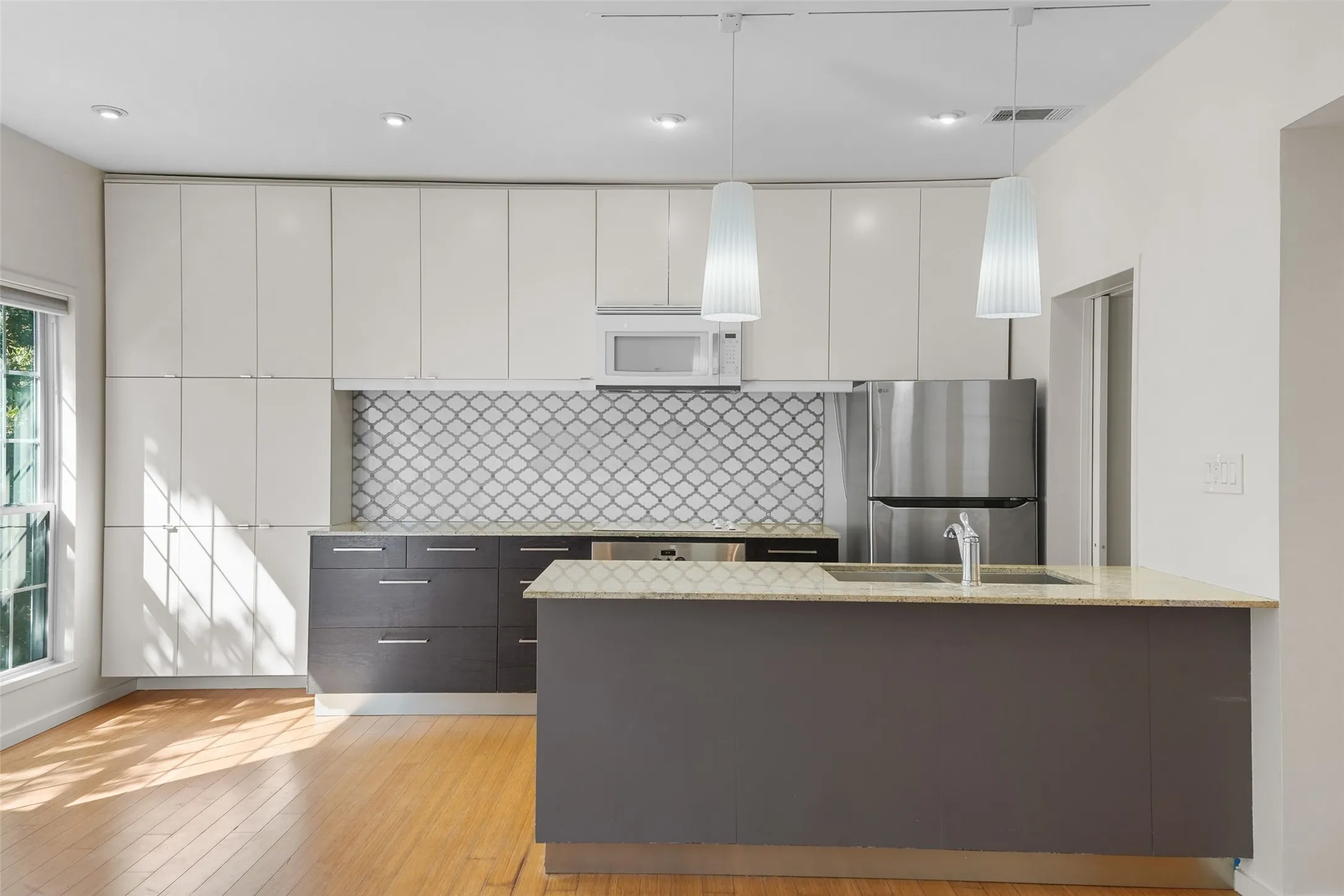 Kitchen with updated backsplash