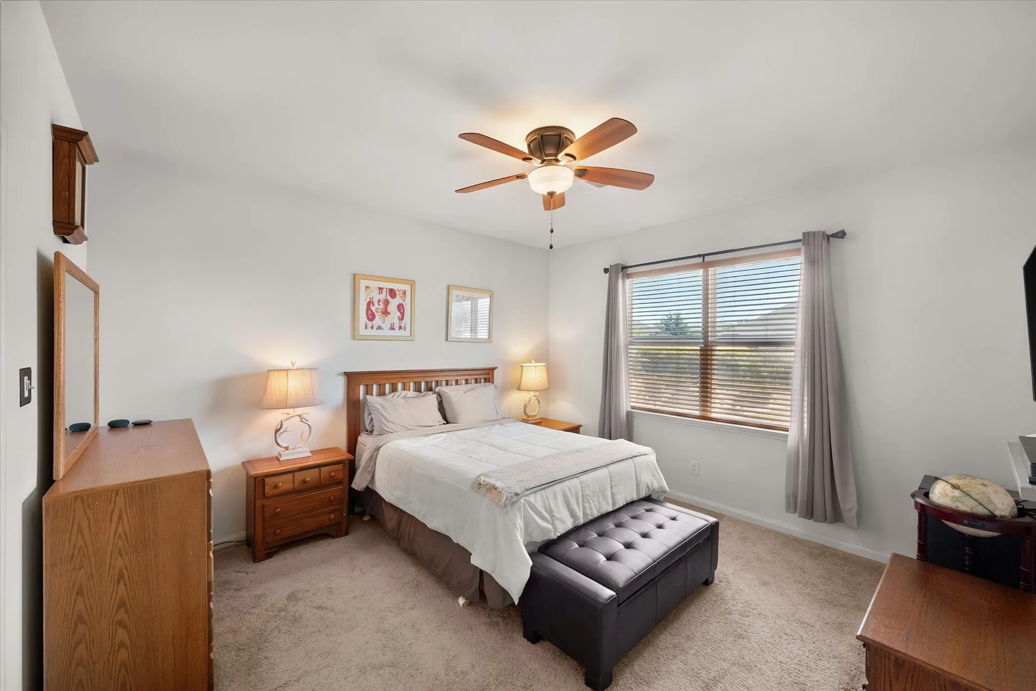 Neutral wall paint and carpeted flooring