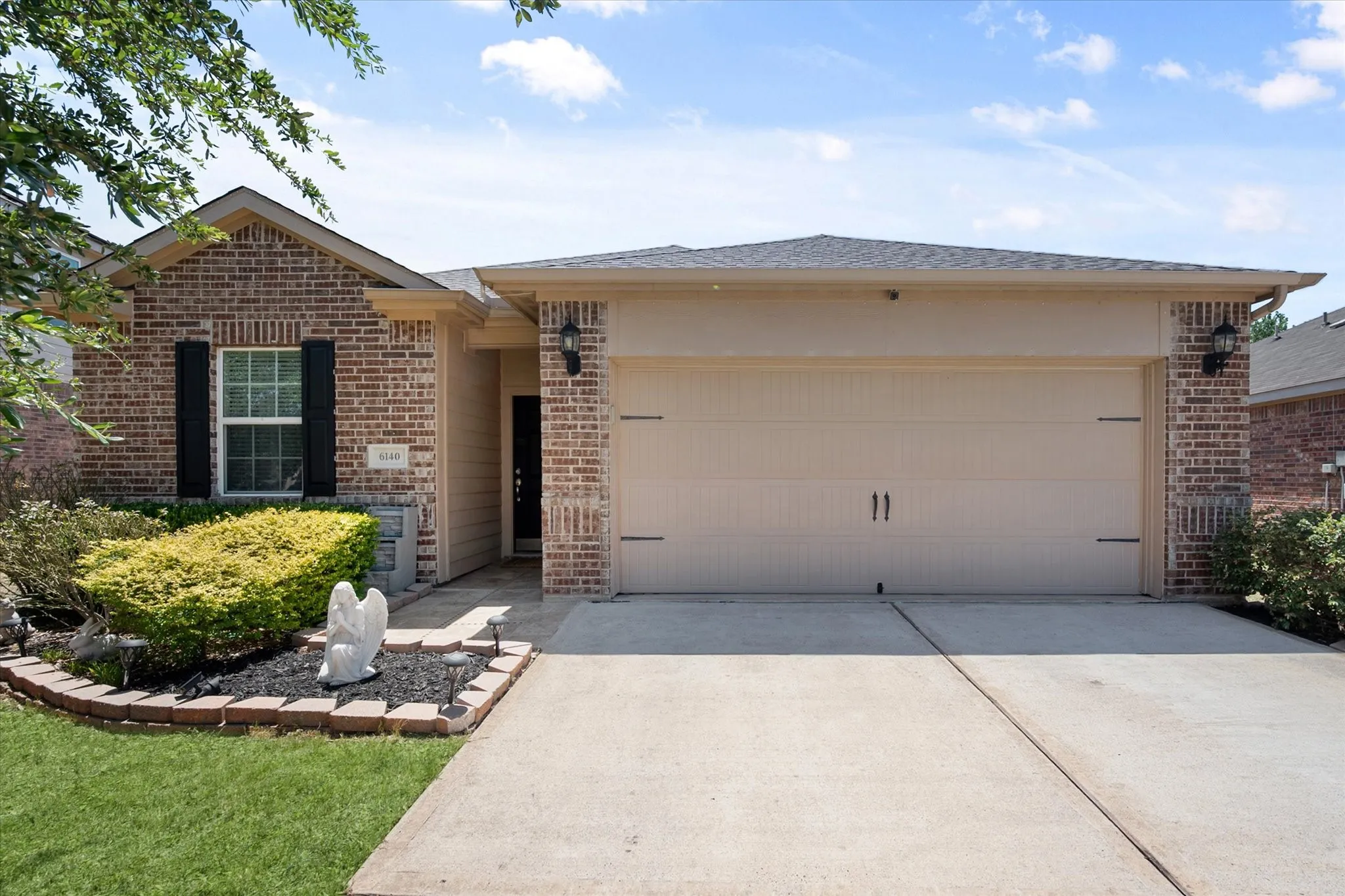 Brick exterior with a gabled roofline