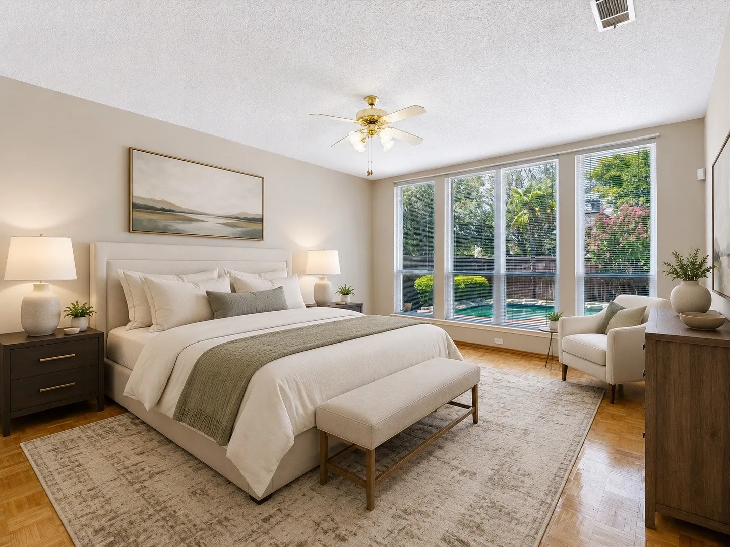 Wood-finish flooring, full-wall window system, ceiling fan, and recessed lighting