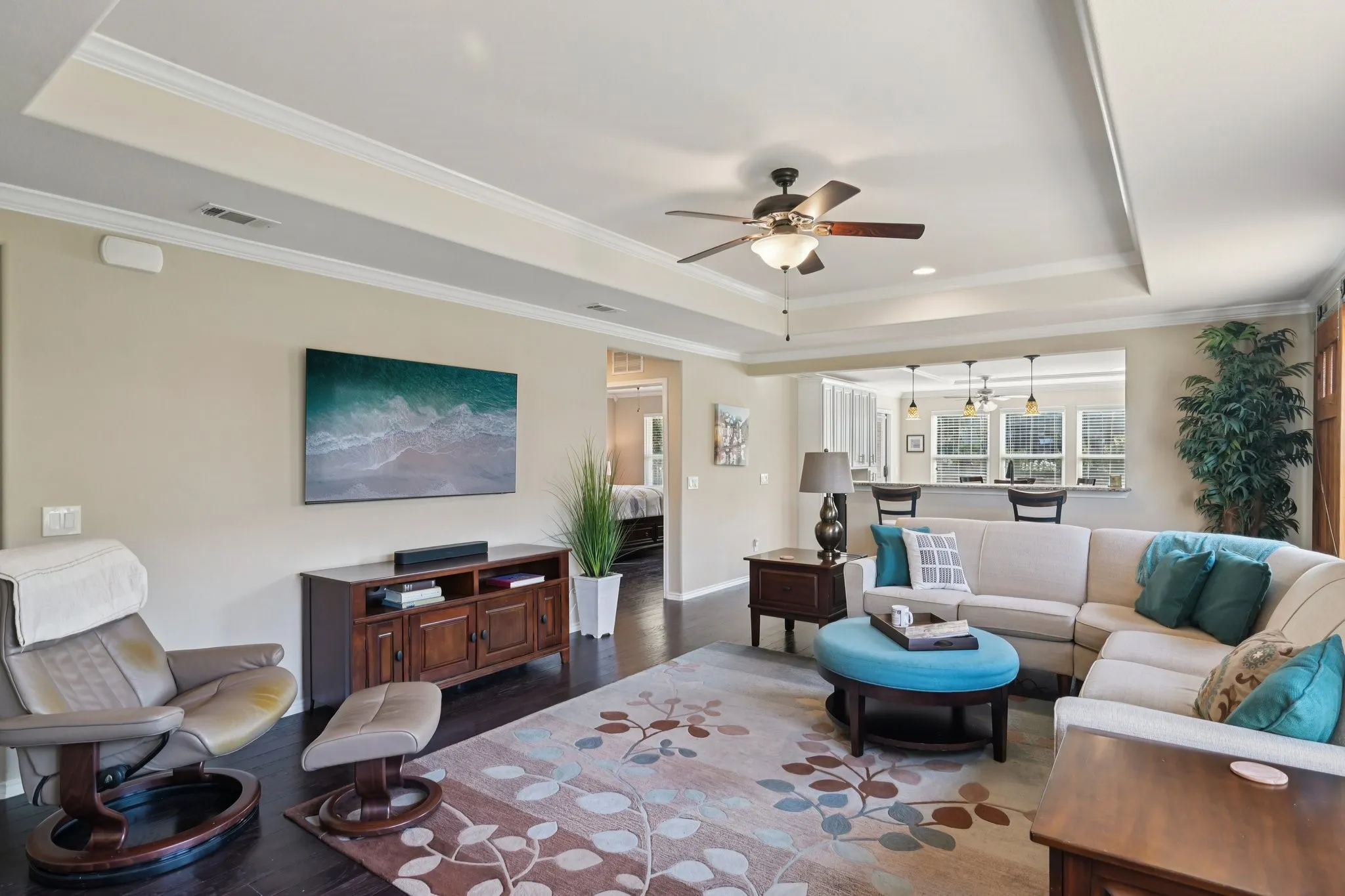 Open concept living room and kitchen - flooded with natural light