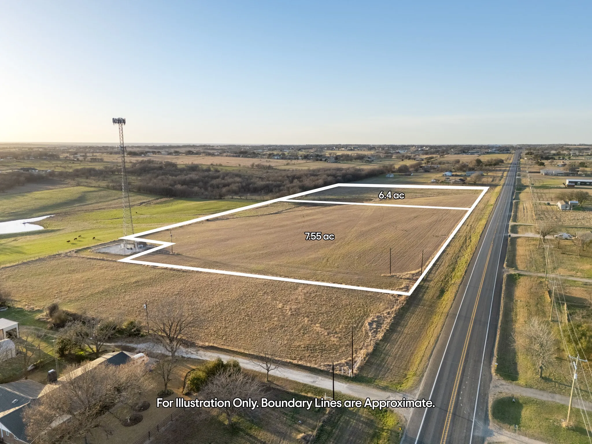 7.55-acre parcel with an adjacent 6.4-acre parcel, featuring direct road frontage and open land