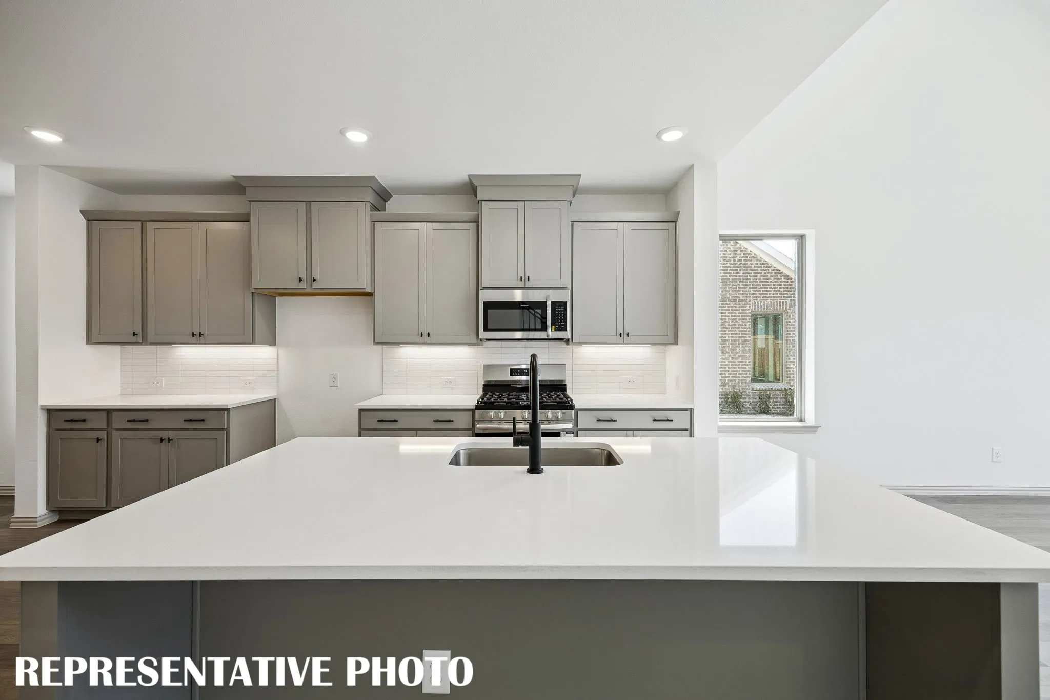 Friends and family will love gathering round this beautiful kitchen island!  REPRESENTATIVE PHOTO
