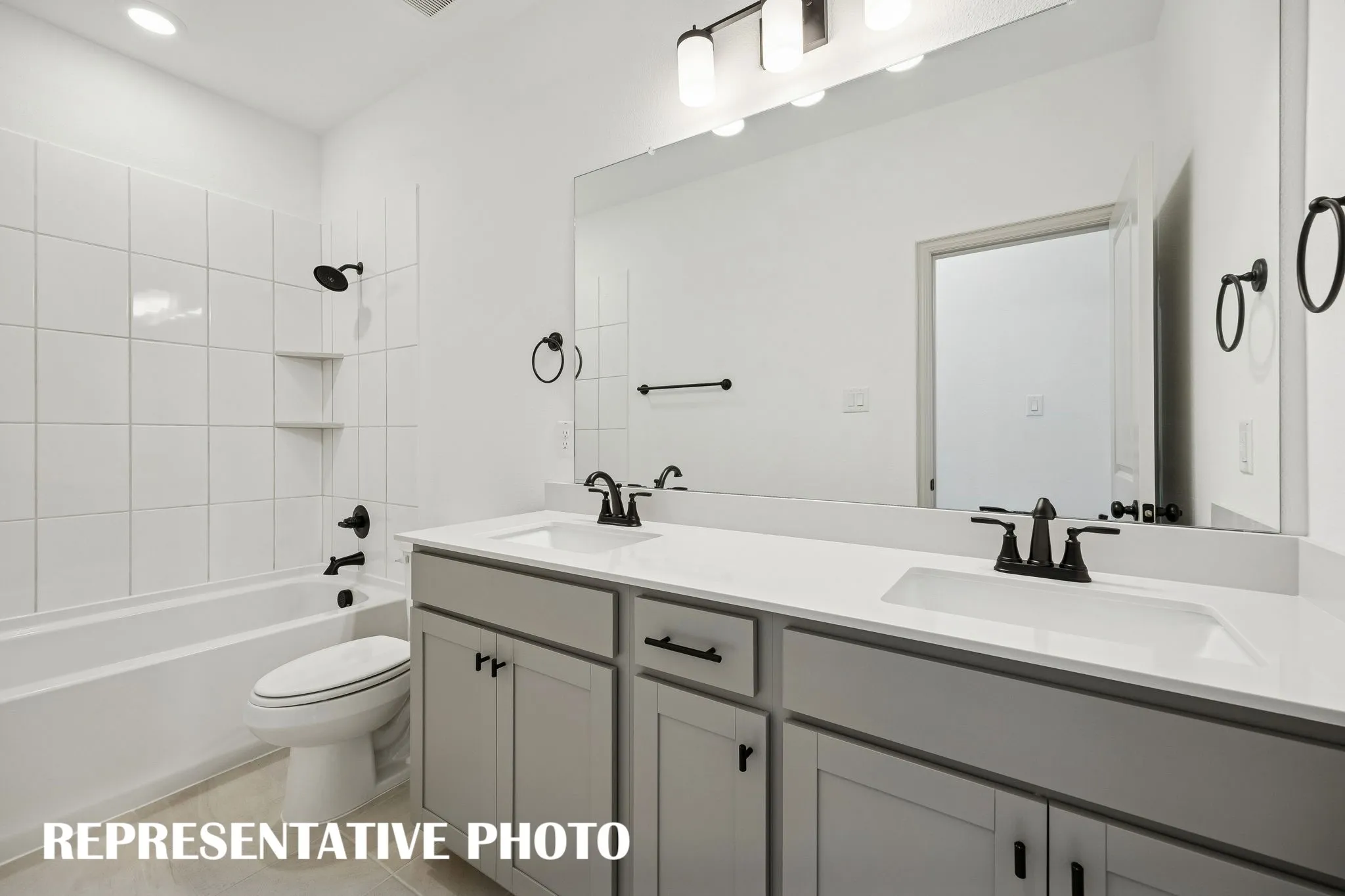With vanity space for two, friends and family will feel right at home in this guest bath.  REPRESENTATIVE​​‌​​​​‌​​‌‌​‌‌​​​‌‌​‌​‌​‌​​​‌​​ PHOTO