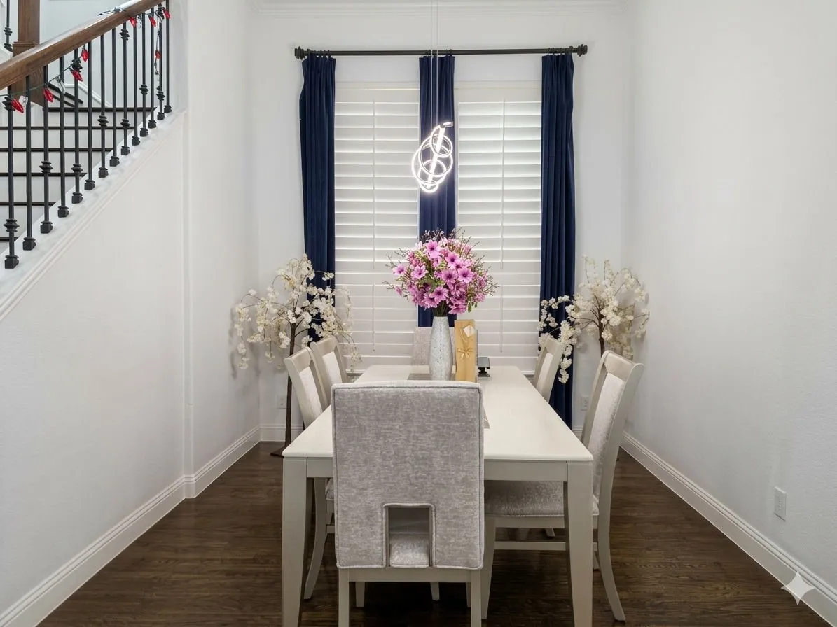 Dark wood-finish flooring with white baseboards