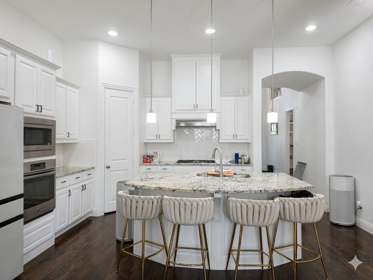 Gourmet kitchen with a large island, stainless steel appliances, white cabinetry, a tile backsplash, and dark wood-finish flooring