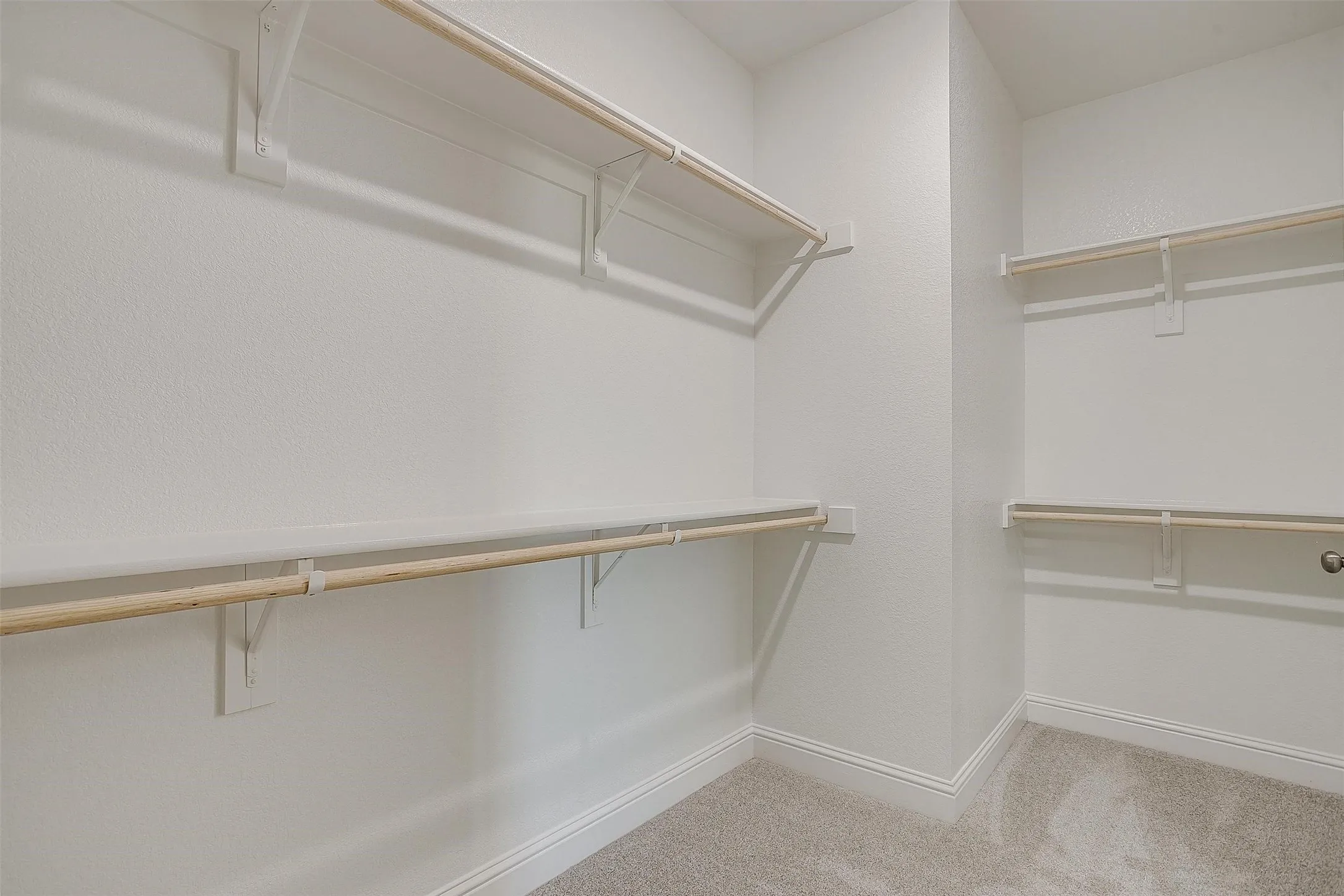 Built-in shelving with hanging rods