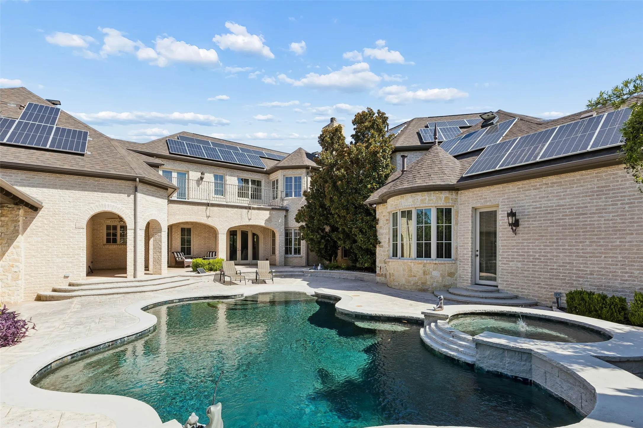 Pool is heated and has a water feature