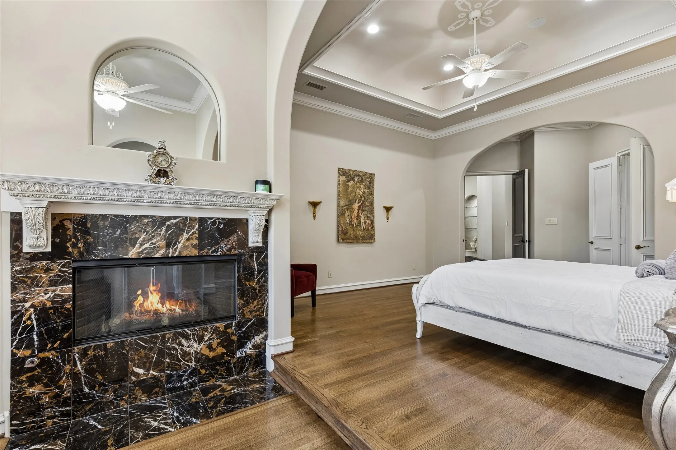 Sitting area with fireplace in primary